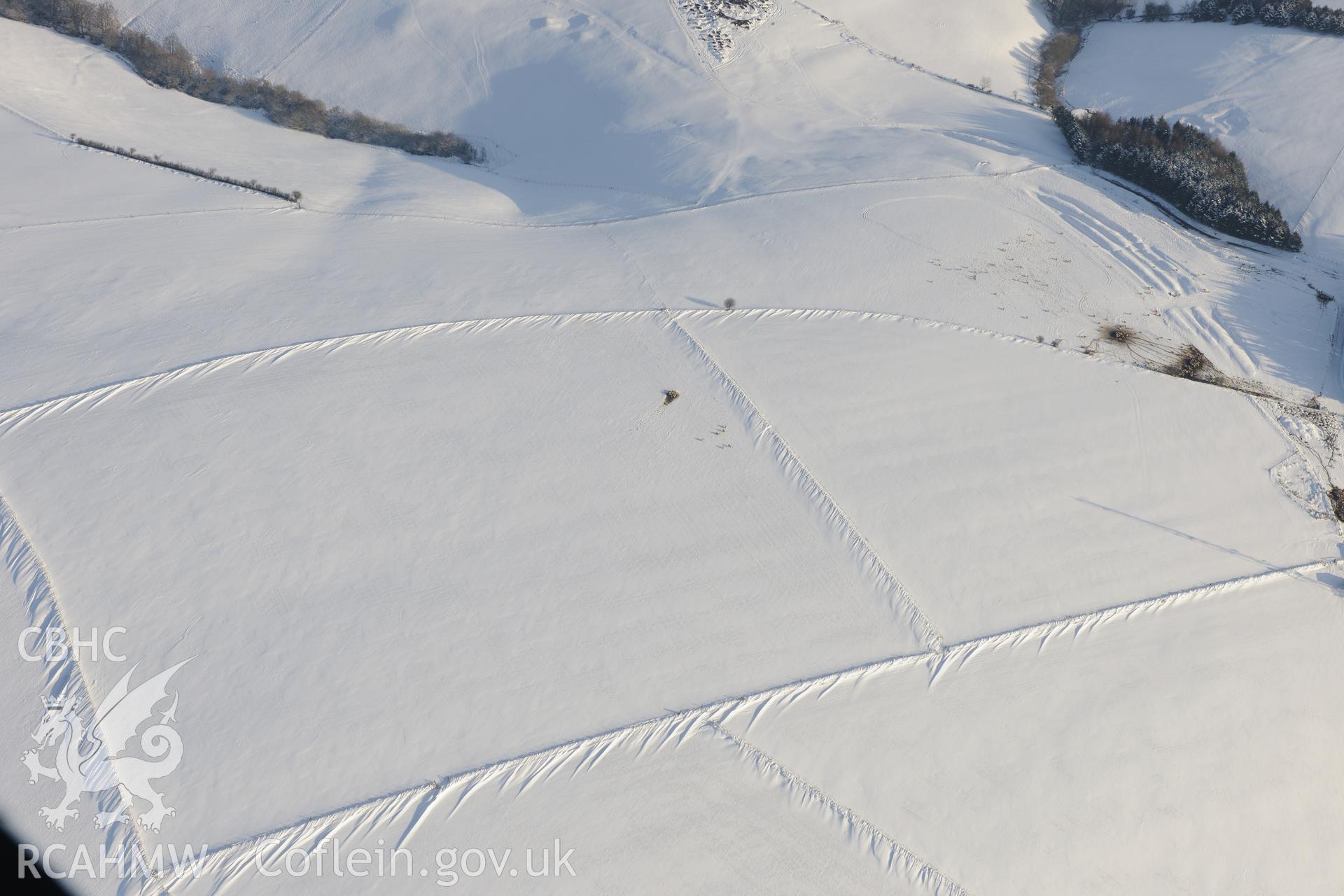 Mynydd Baiden settlement, north west of Bridgend. Oblique aerial photograph taken during the Royal Commission?s programme of archaeological aerial reconnaissance by Toby Driver on 24th January 2013.