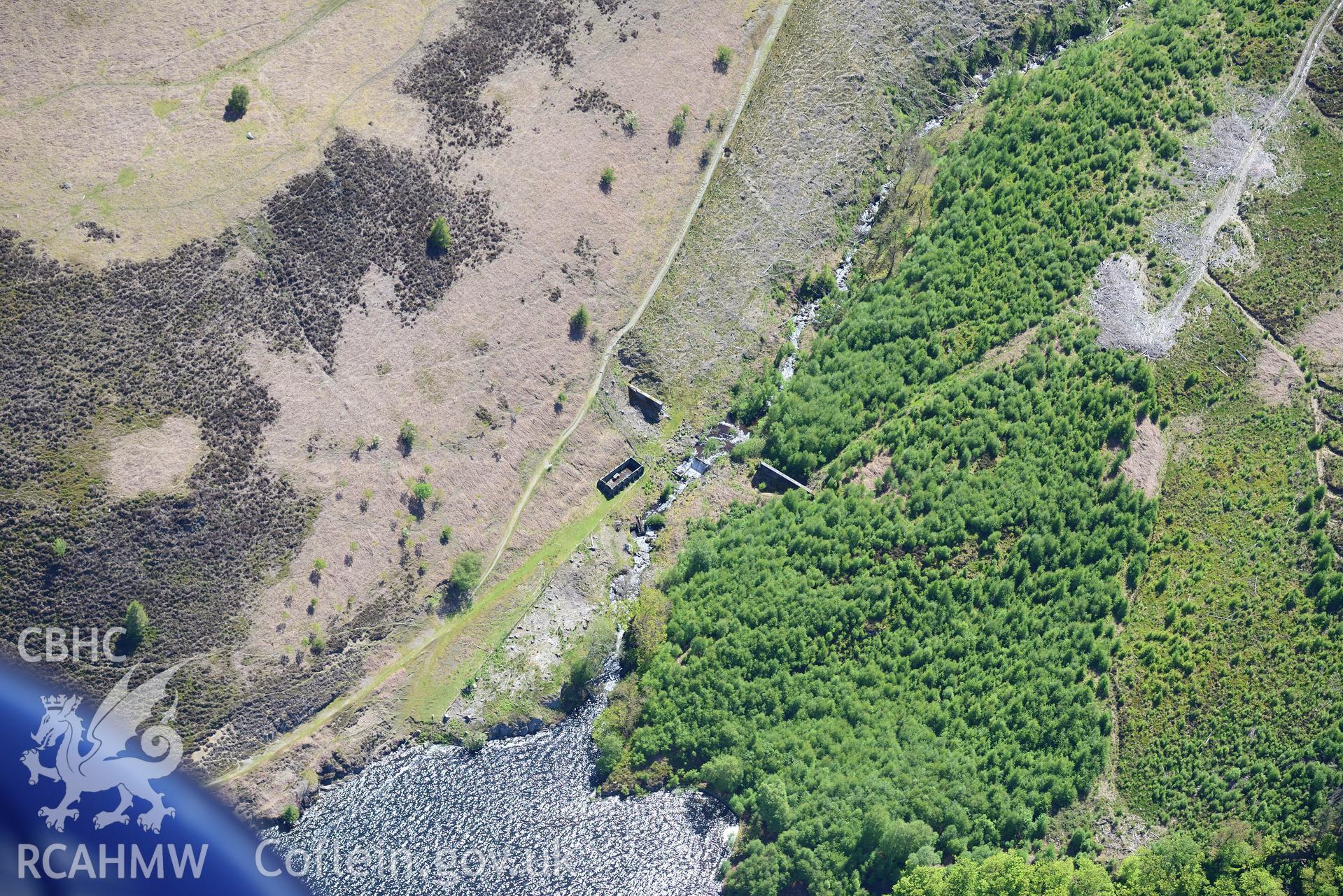 Nant-y-Gro Dam -'Dambusters' testing dam at Elan Valley water scheme. Oblique aerial photograph taken during the Royal Commission's programme of archaeological aerial reconnaissance by Toby Driver on 3rd June 2015.