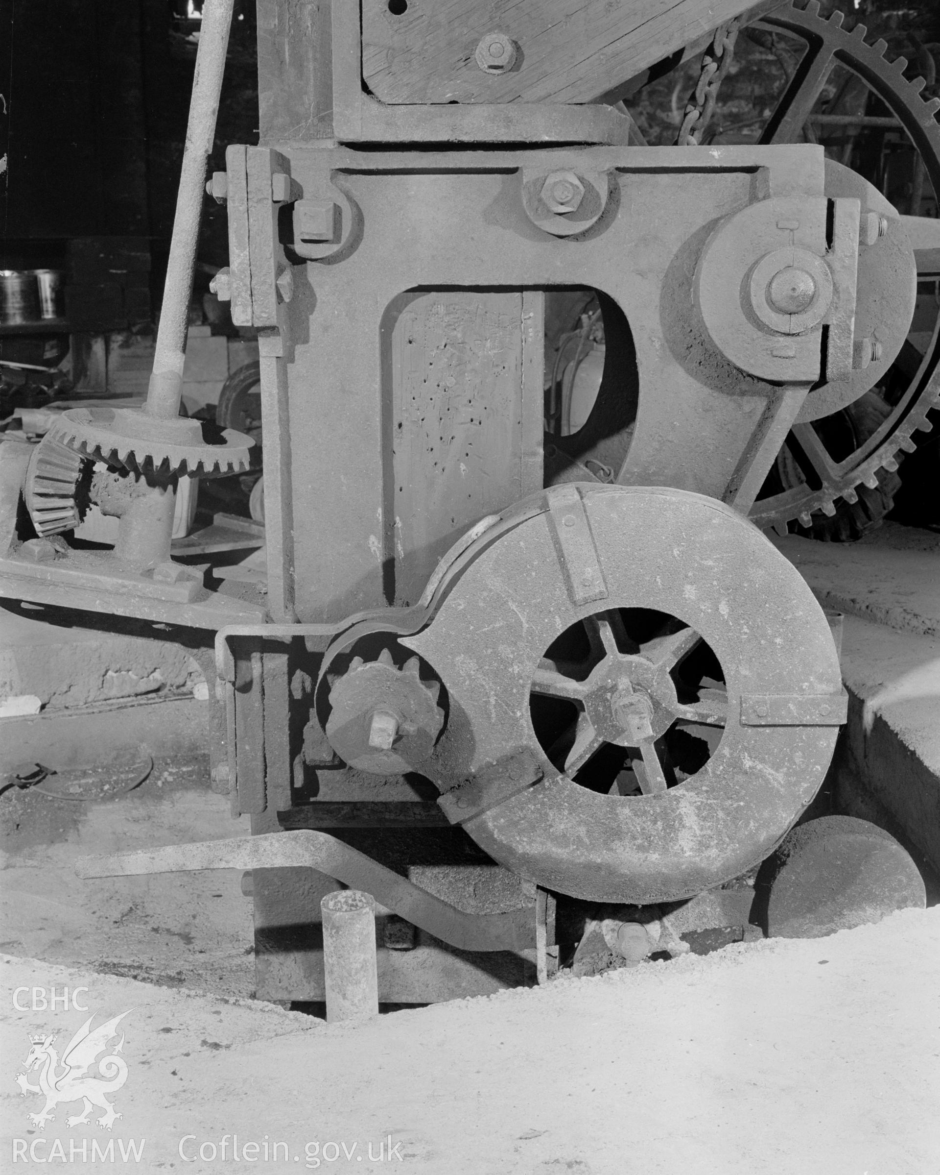 Digital copy of a black and white negative showing detail of the crane at Player's Works Foundry, Clydach, taken by RCAHMW, undated.