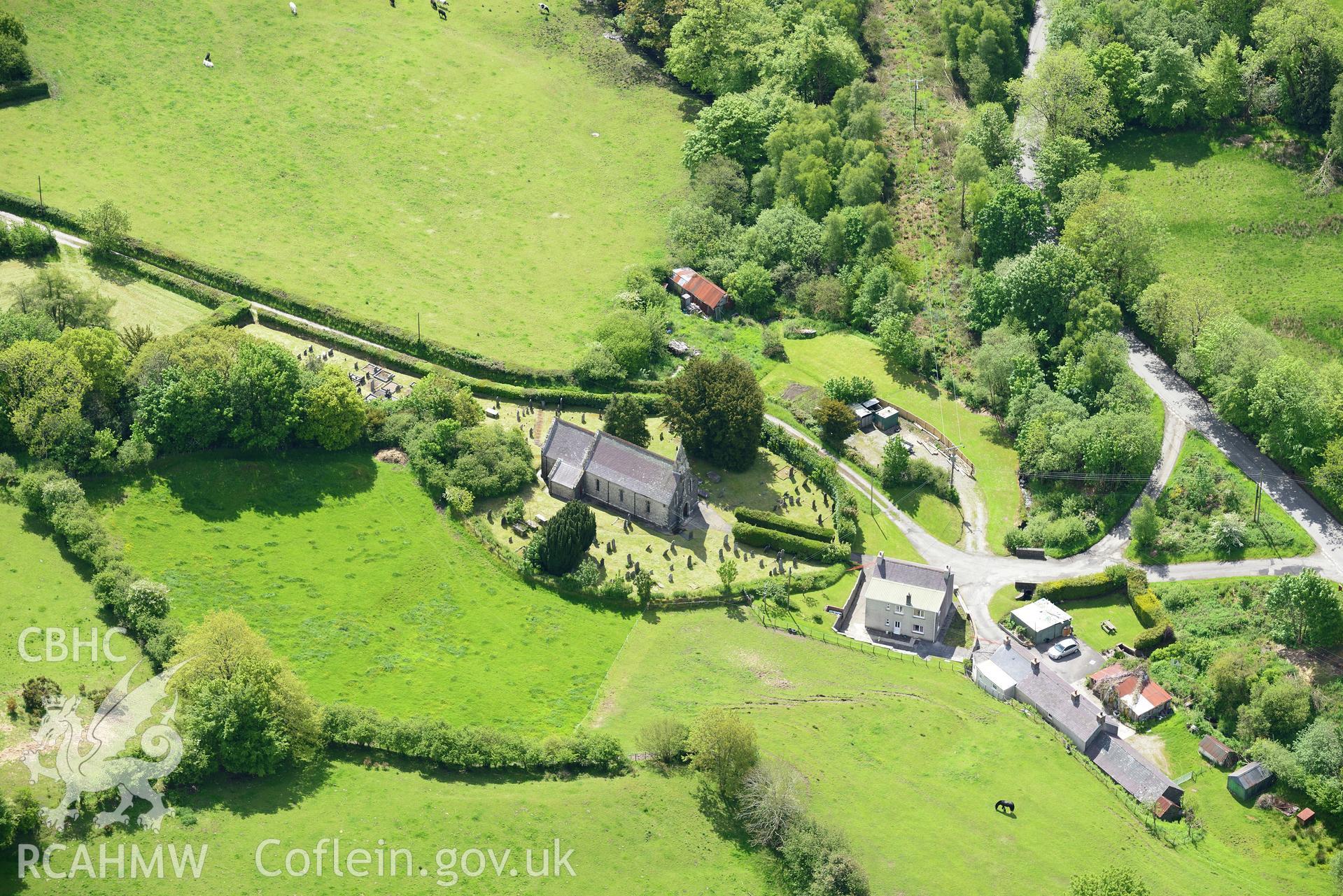 St. Sulien's Church and the village of Silian. Oblique aerial photograph taken during the Royal Commission's programme of archaeological aerial reconnaissance by Toby Driver on 3rd June 2015.