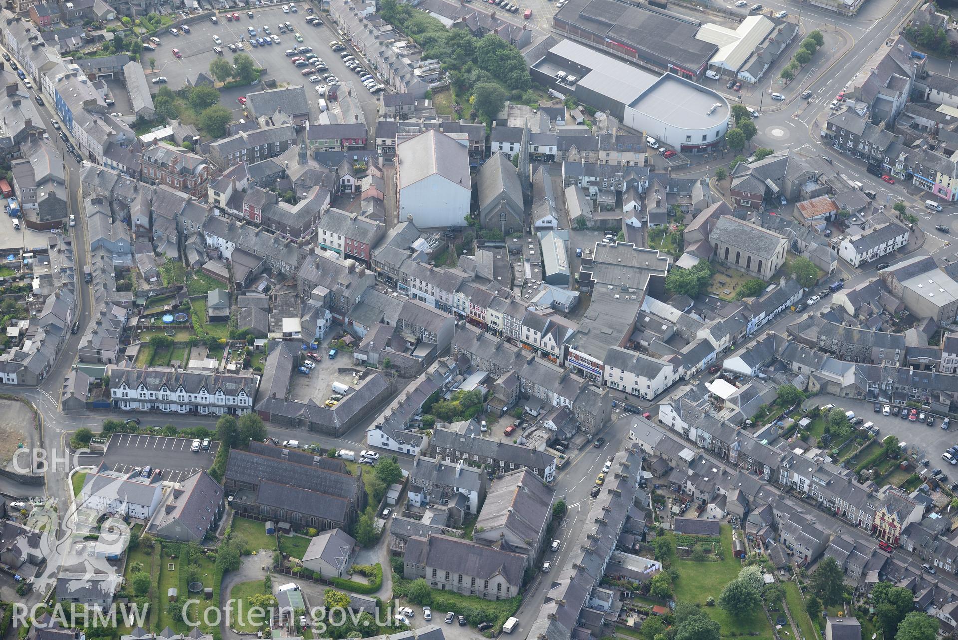 Pen-Lan Welsh Independent Chapel and St Peters Church in the town of Pwllheli. Oblique aerial photograph taken during the Royal Commission's programme of archaeological aerial reconnaissance by Toby Driver on 23rd June 2015.