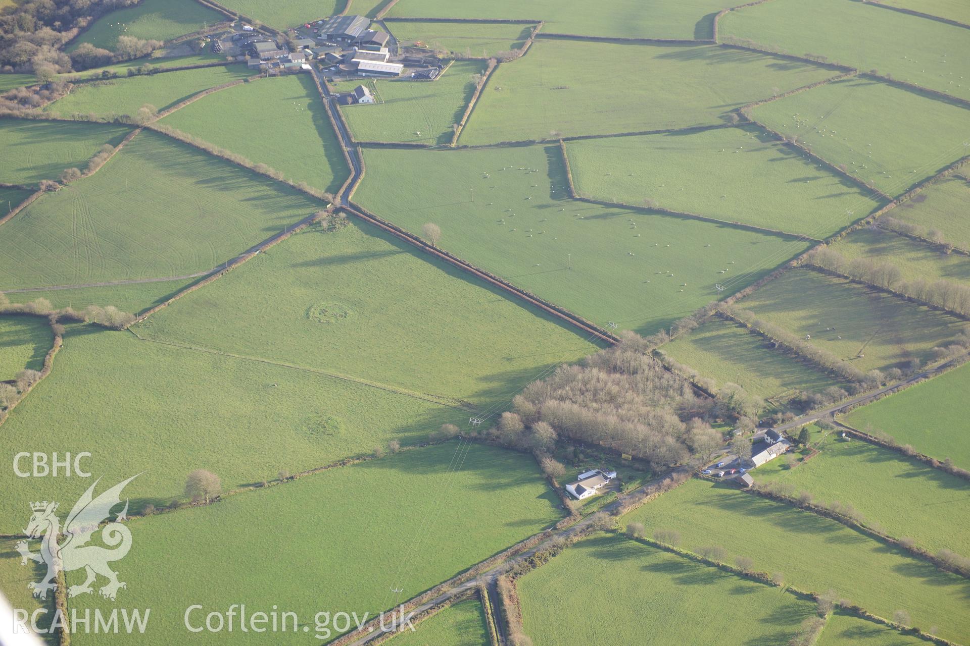 Blaennantrhyd Cairns I - III and the Blaennantrhys Stone. Oblique aerial photograph taken during the Royal Commission's programme of archaeological aerial reconnaissance by Toby Driver on 6th January 2015.