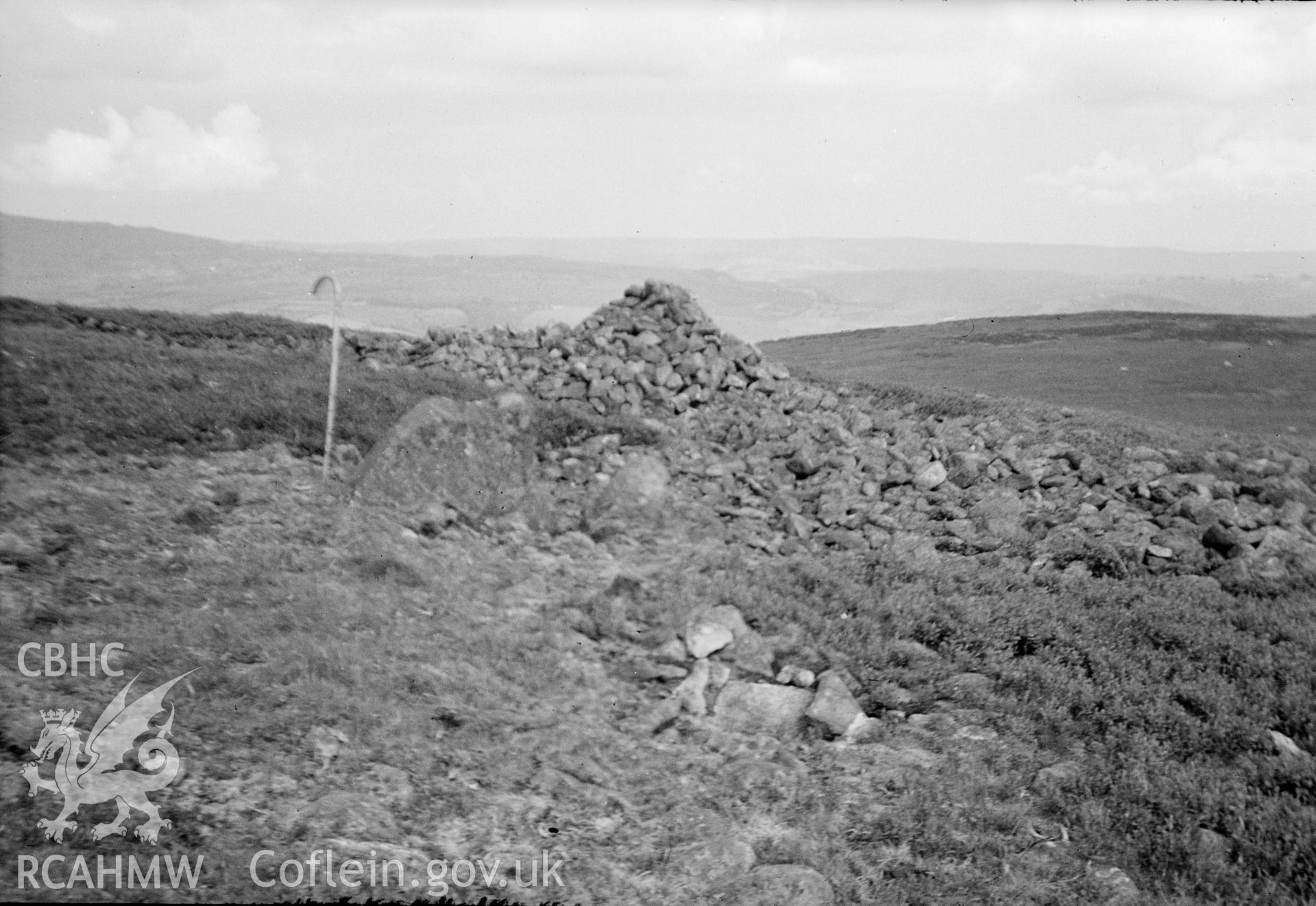 Digital copy of a nitrate negative showing Corndon Hill Cairns. From Cadw Monuments in Care  Collection.