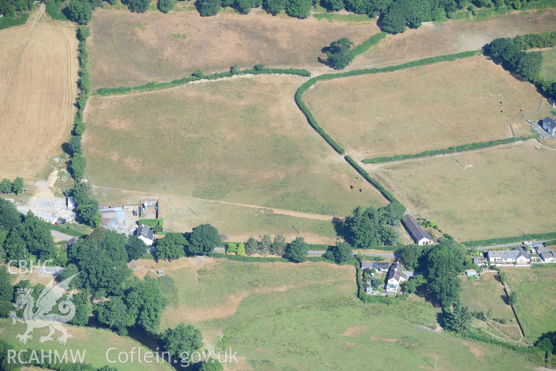 Royal Commission aerial photography of parchmarks of the Roman road approaching Llanfair Clydogau, taken on 19th July 2018 during the 2018 drought.