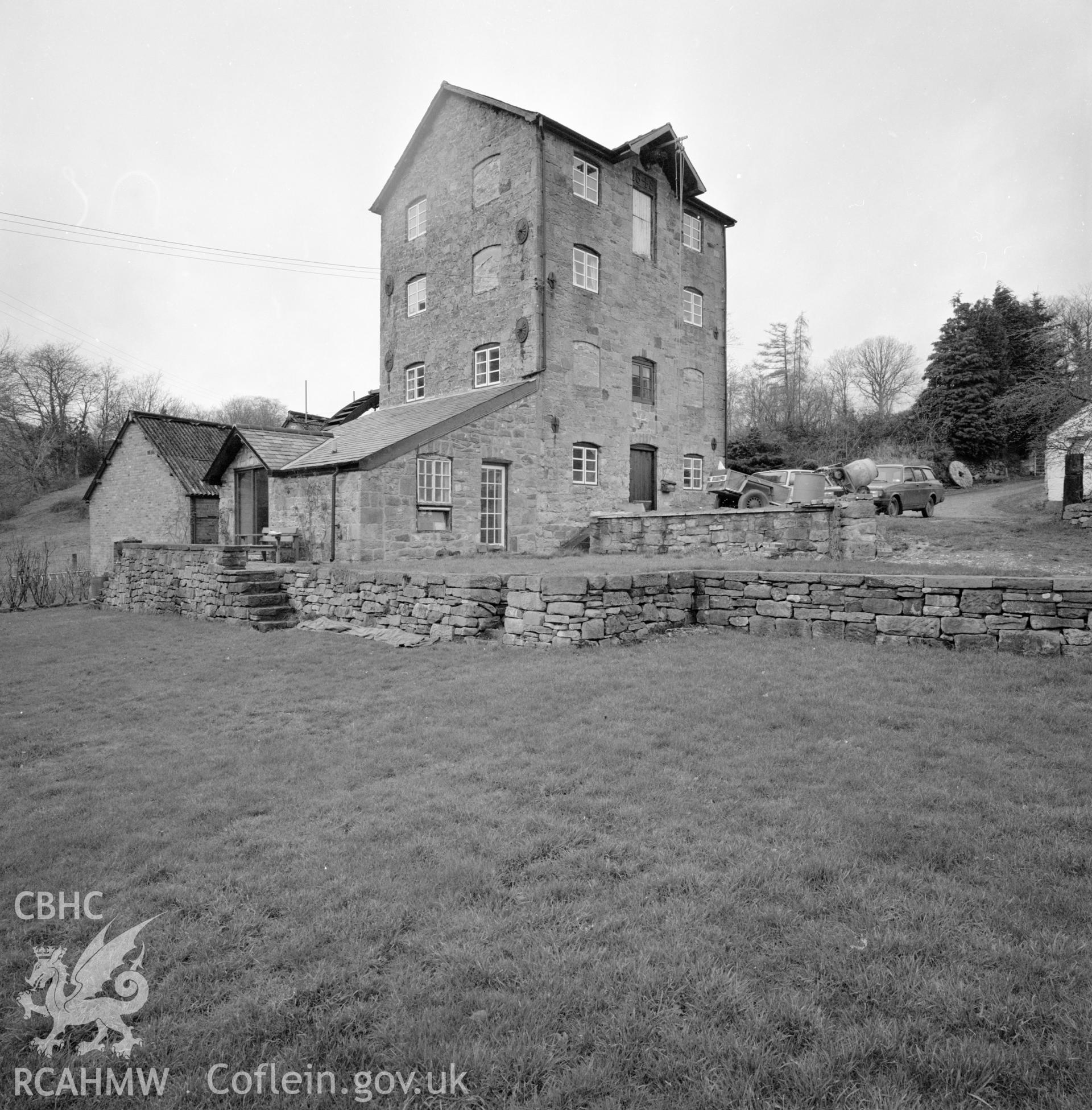 Digital copy of a black and white negative showing exterior view of Trevor Old Mill taken by RCAHMW, 1987.