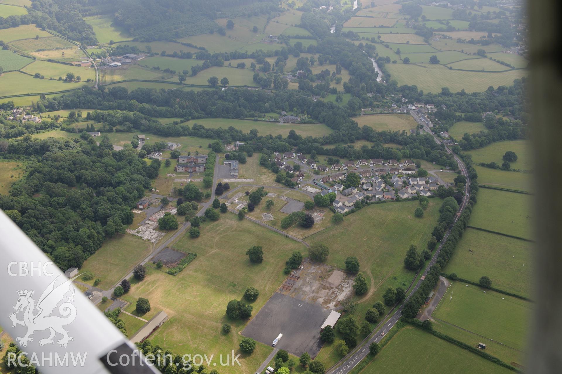 Cwrt-y-Gollen house, garden and army camp, south east of Crickhowell. Oblique aerial photograph taken during Royal Commission?s programme of archaeological aerial reconnaissance by Toby Driver on 1st August 2013.