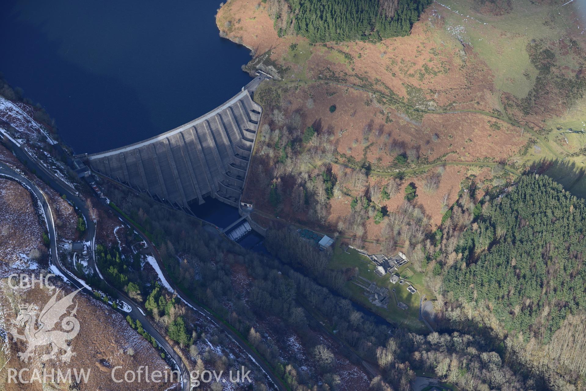 Bryntail or Glyn lead mine, on the southern banks of Llyn Clywedog reservoir, north west of Llanidloes. Oblique aerial photograph taken during the Royal Commission's programme of archaeological aerial reconnaissance by Toby Driver on 4th February 2015.