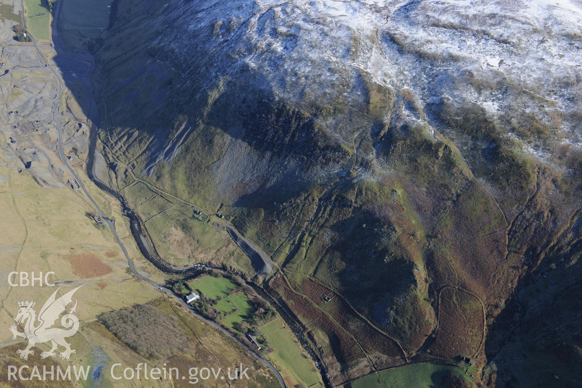 Nevill Place Miners' Cottages; dressing mill and lead mine barracks at Cwmystwyth Lead Mine. Oblique aerial photograph taken during the Royal Commission's programme of archaeological aerial reconnaissance by Toby Driver, 4th February 2015.