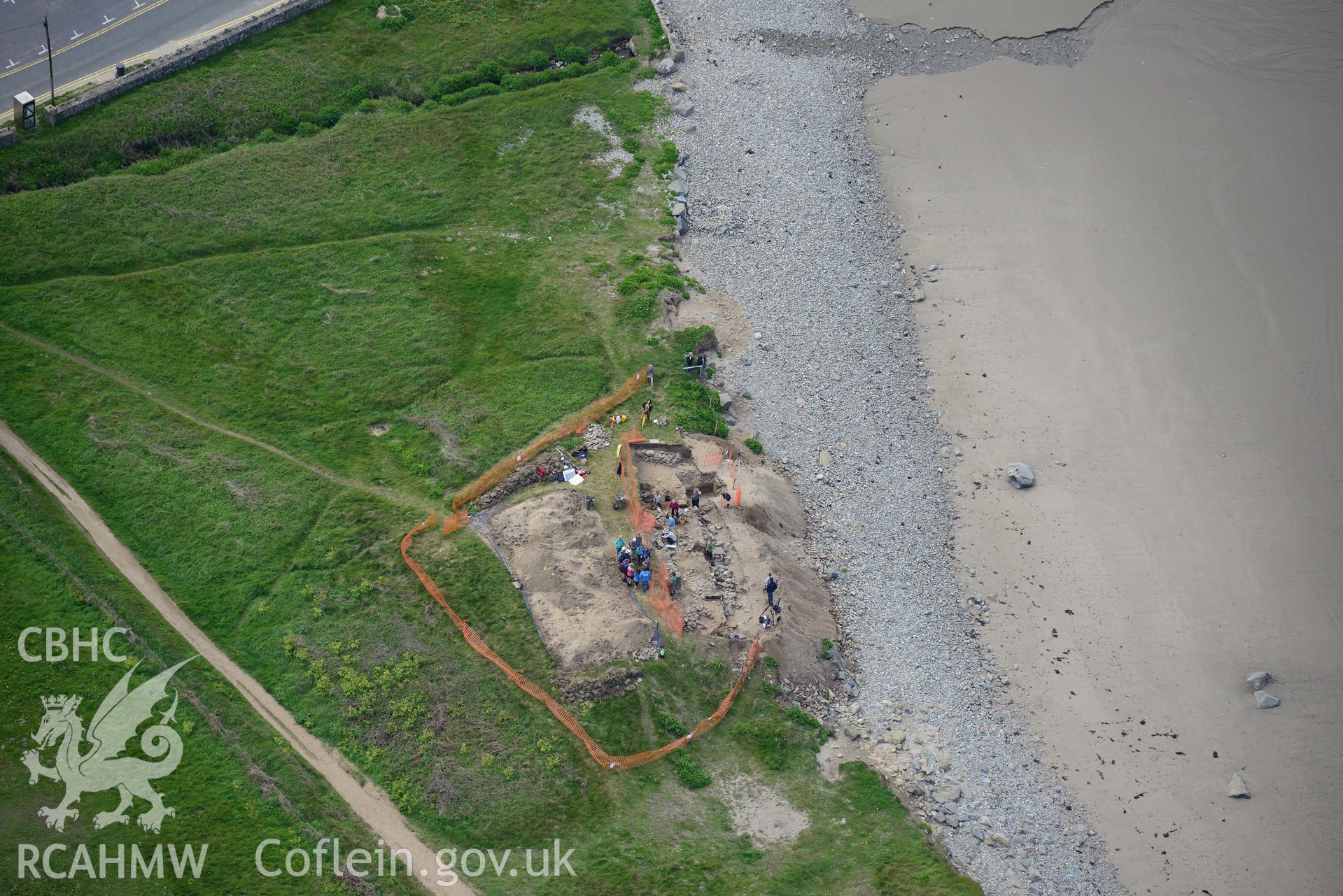 Dyfed Archaeological Trust excavating site of St. Patrick's chapel at Whitesands Bay. Oblique aerial photograph taken during the Royal Commission's programme of archaeological aerial reconnaissance by Toby Driver on 13th May 2015.