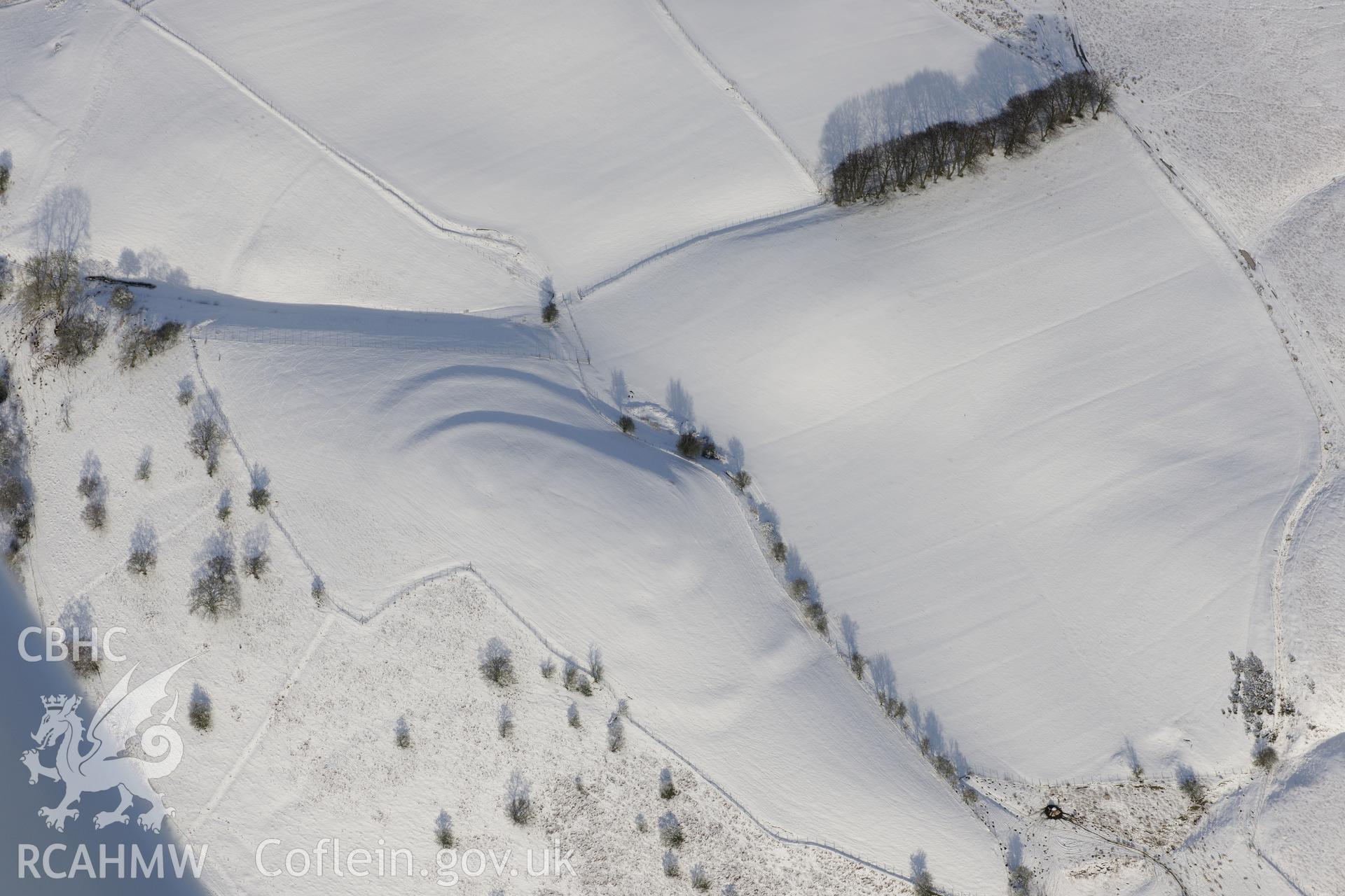 Wern Camp defended enclosure, Glascwm, north east of Builth Wells. Oblique aerial photograph taken during the Royal Commission?s programme of archaeological aerial reconnaissance by Toby Driver on 15th January 2013.