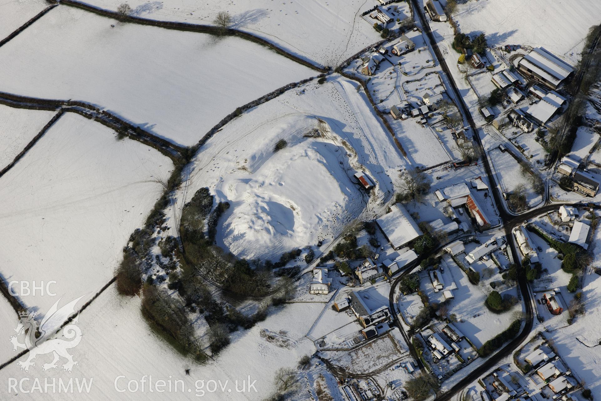 Motte and bailey castle at Painscastle, south east of Builth Wells. Oblique aerial photograph taken during the Royal Commission?s programme of archaeological aerial reconnaissance by Toby Driver on 15th January 2013.