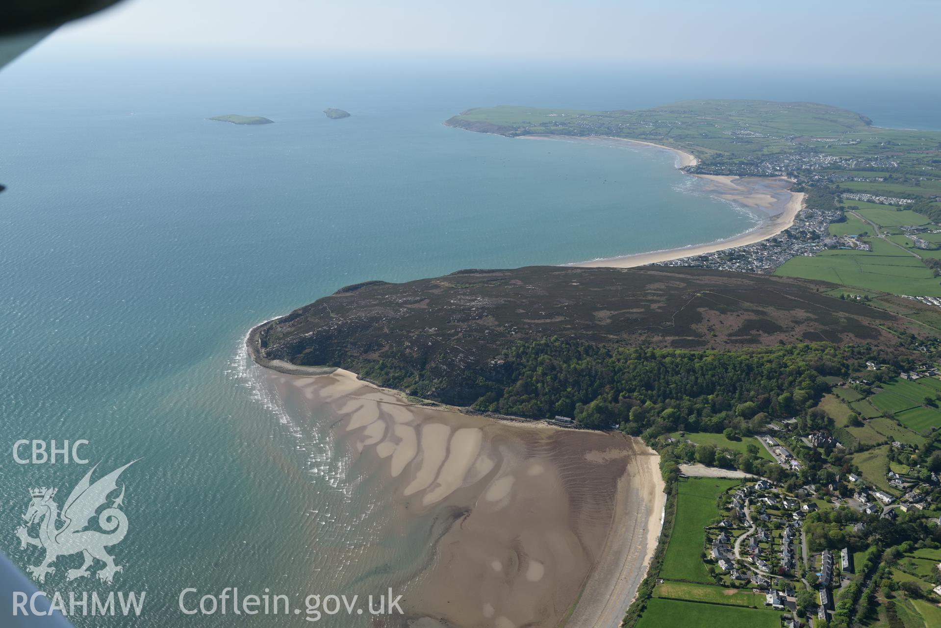 Aerial photography of cottages on Llanbedrog beach taken on 3rd May 2017.  Baseline aerial reconnaissance survey for the CHERISH Project. ? Crown: CHERISH PROJECT 2017. Produced with EU funds through the Ireland Wales Co-operation Programme 2014-2020. Al