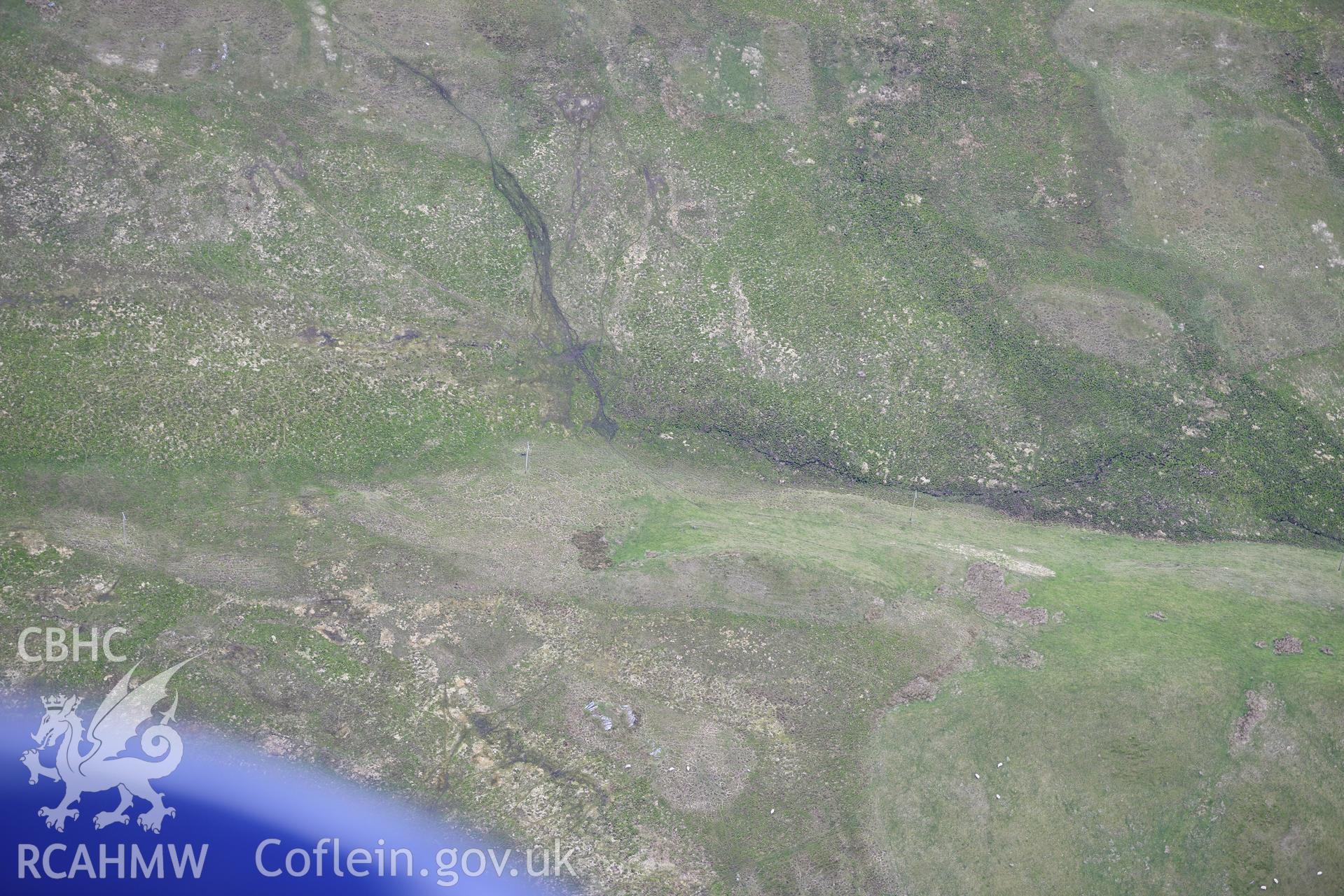 Cyrnau Long Hut. Oblique aerial photograph taken during the Royal Commission's programme of archaeological aerial reconnaissance by Toby Driver on 3rd June 2015.