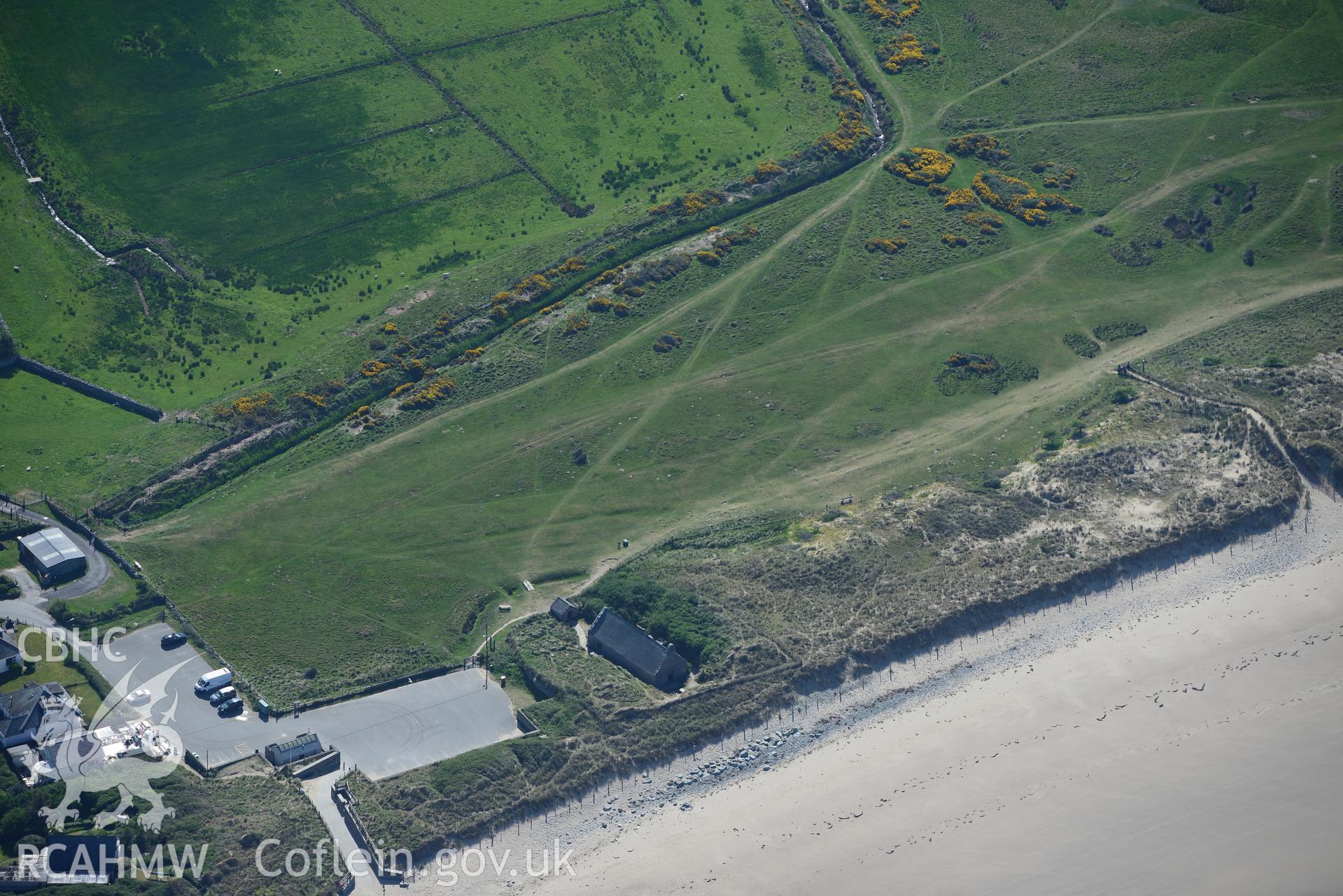 Aerial photography of St Tanwg's Church taken on 3rd May 2017.  Baseline aerial reconnaissance survey for the CHERISH Project. ? Crown: CHERISH PROJECT 2017. Produced with EU funds through the Ireland Wales Co-operation Programme 2014-2020. All material