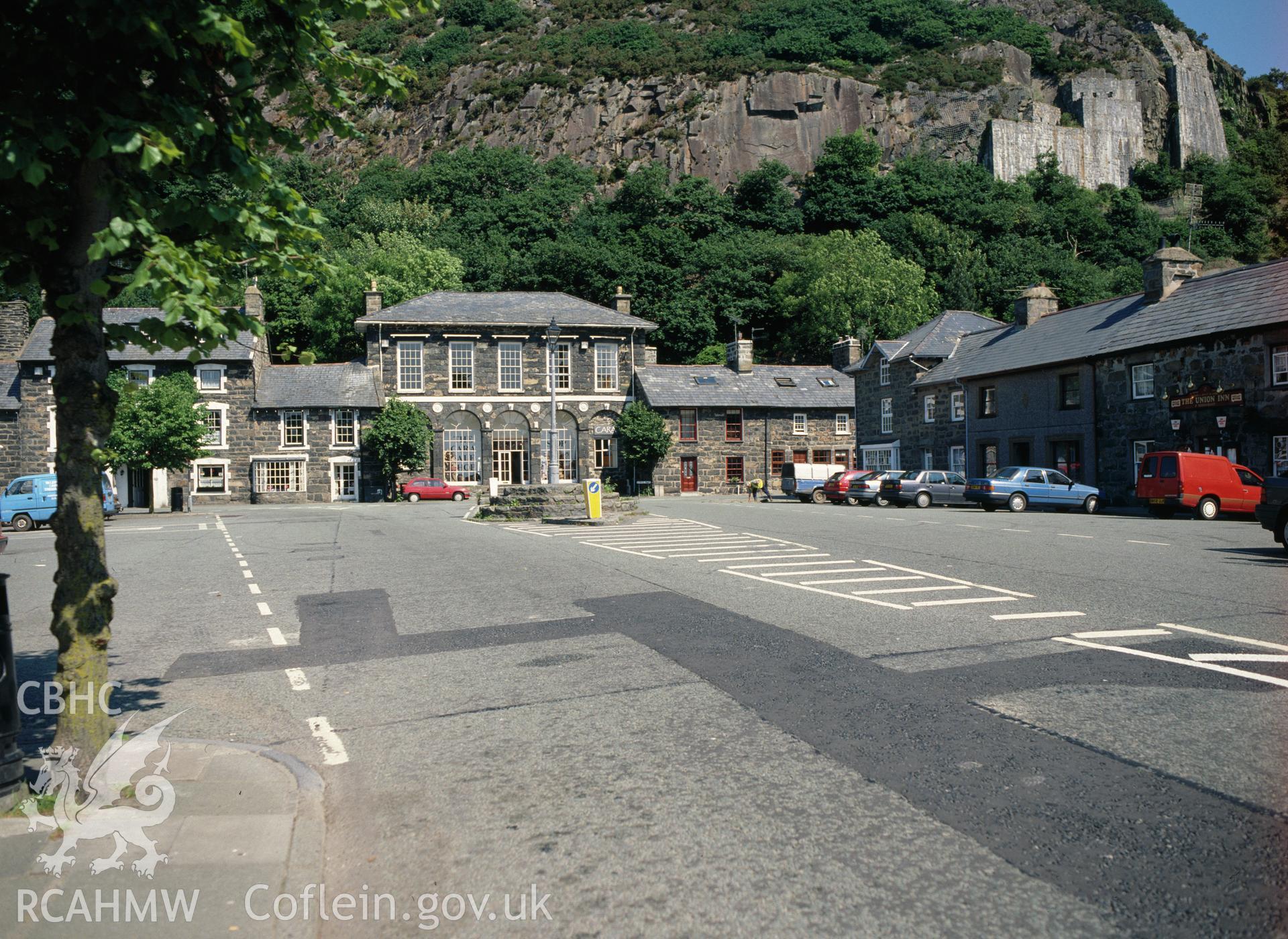 Digital copy of a colour negative showing Tremadog Market Hall and Square.