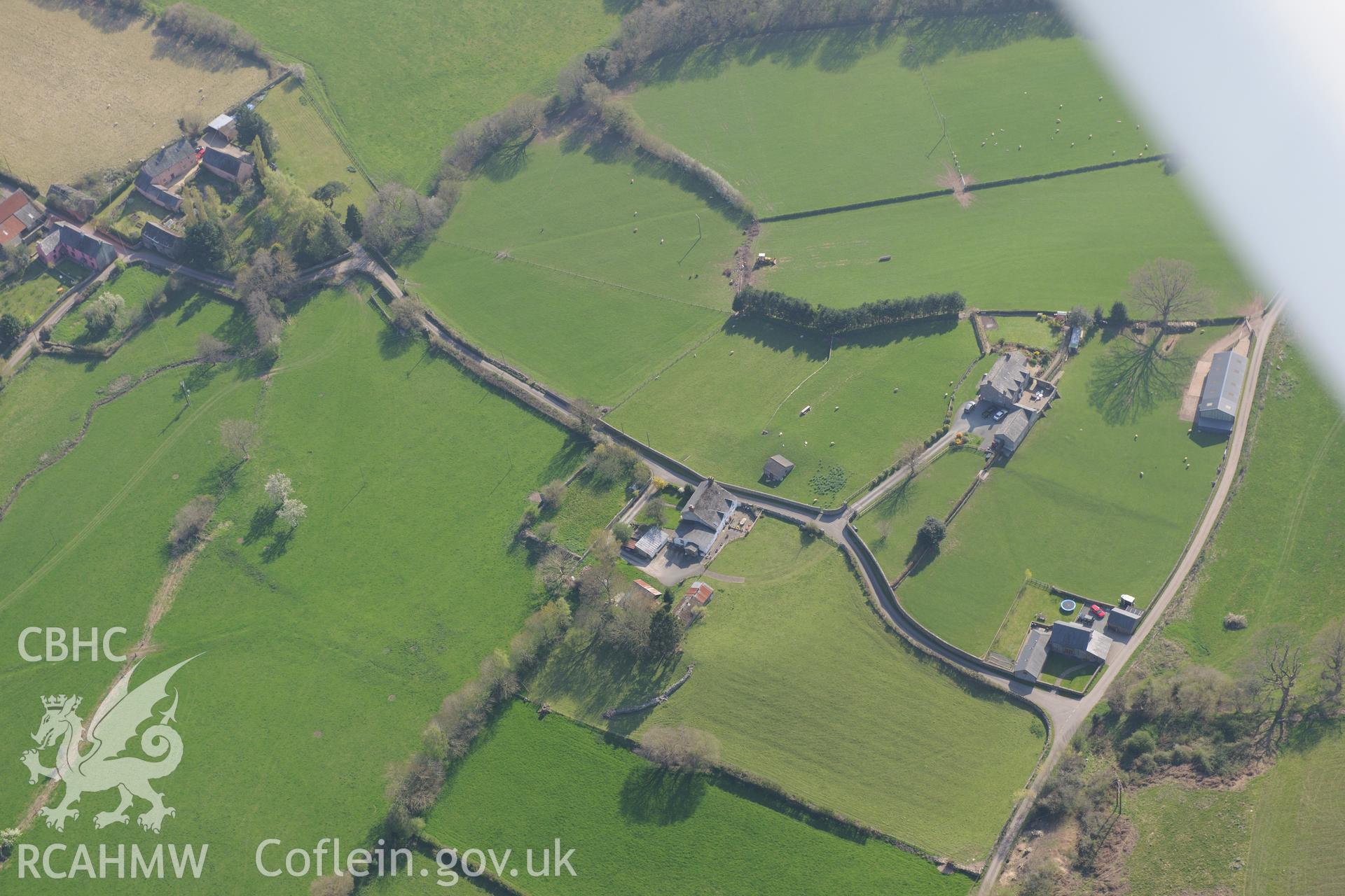 Pen-y-Gaer, Tretower; Greenhill Farmstead, Farmhouse, Barn and Cow-house . Oblique aerial photograph taken during the Royal Commission's programme of archaeological aerial reconnaissance by Toby Driver on 21st April 2015