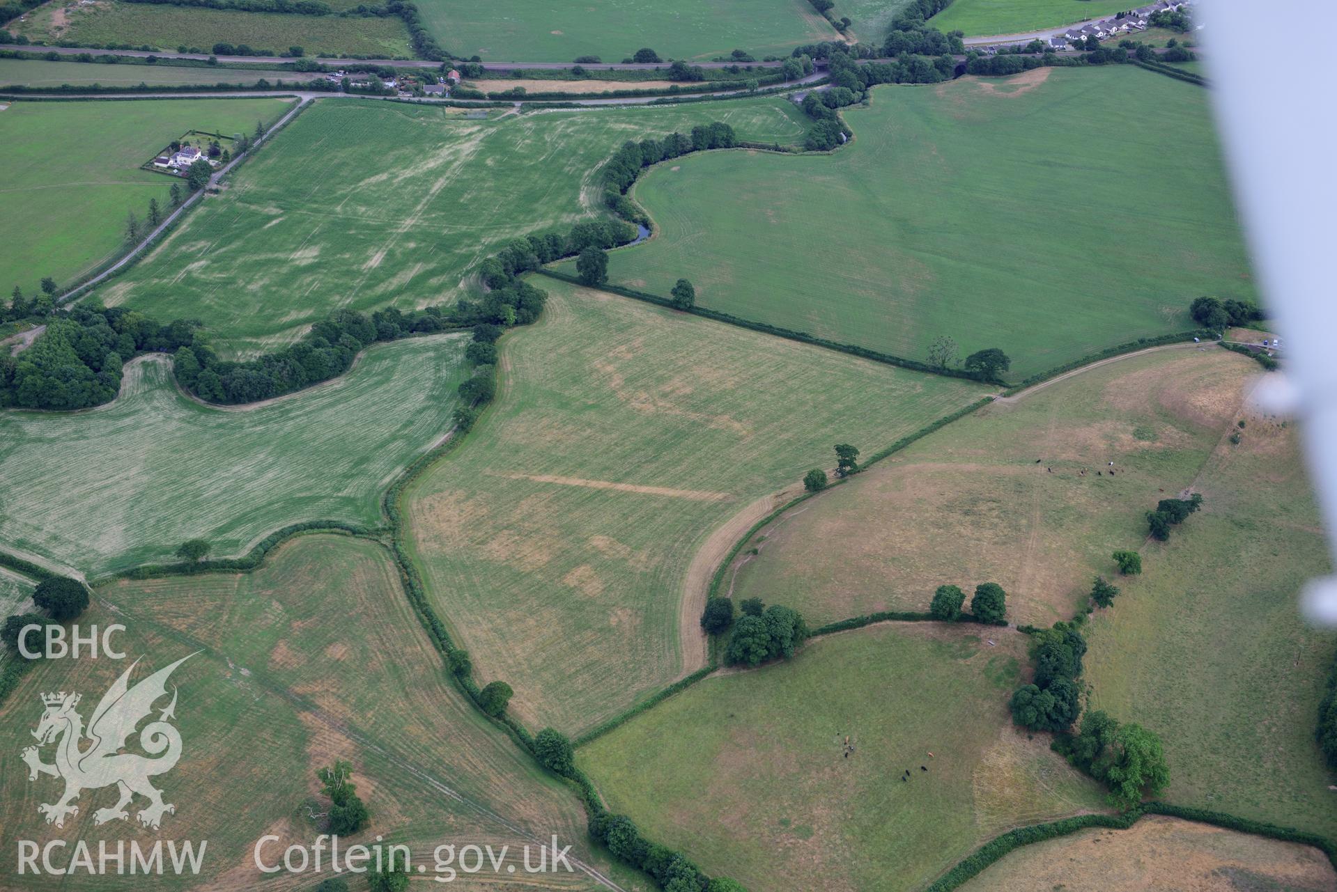 Royal Commission aerial photography of parchmarks of the Roman road at Pontcowin taken on 17th July 2018 during the 2018 drought.