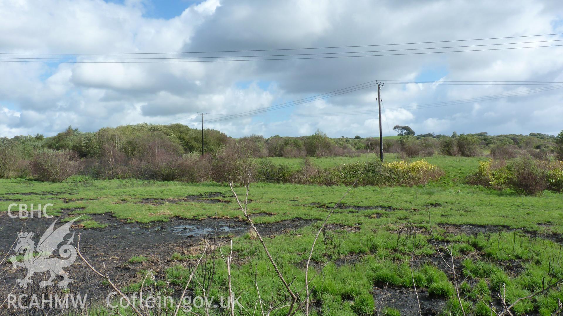 View from Carn Goch, looking east across raised ground around northern edge of the common. Photographed during Setting Impact Assessment of Land off Phoenix Way, Garngoch Business Village, Swansea, by Archaeology Wales, 2018. Project number P2631.