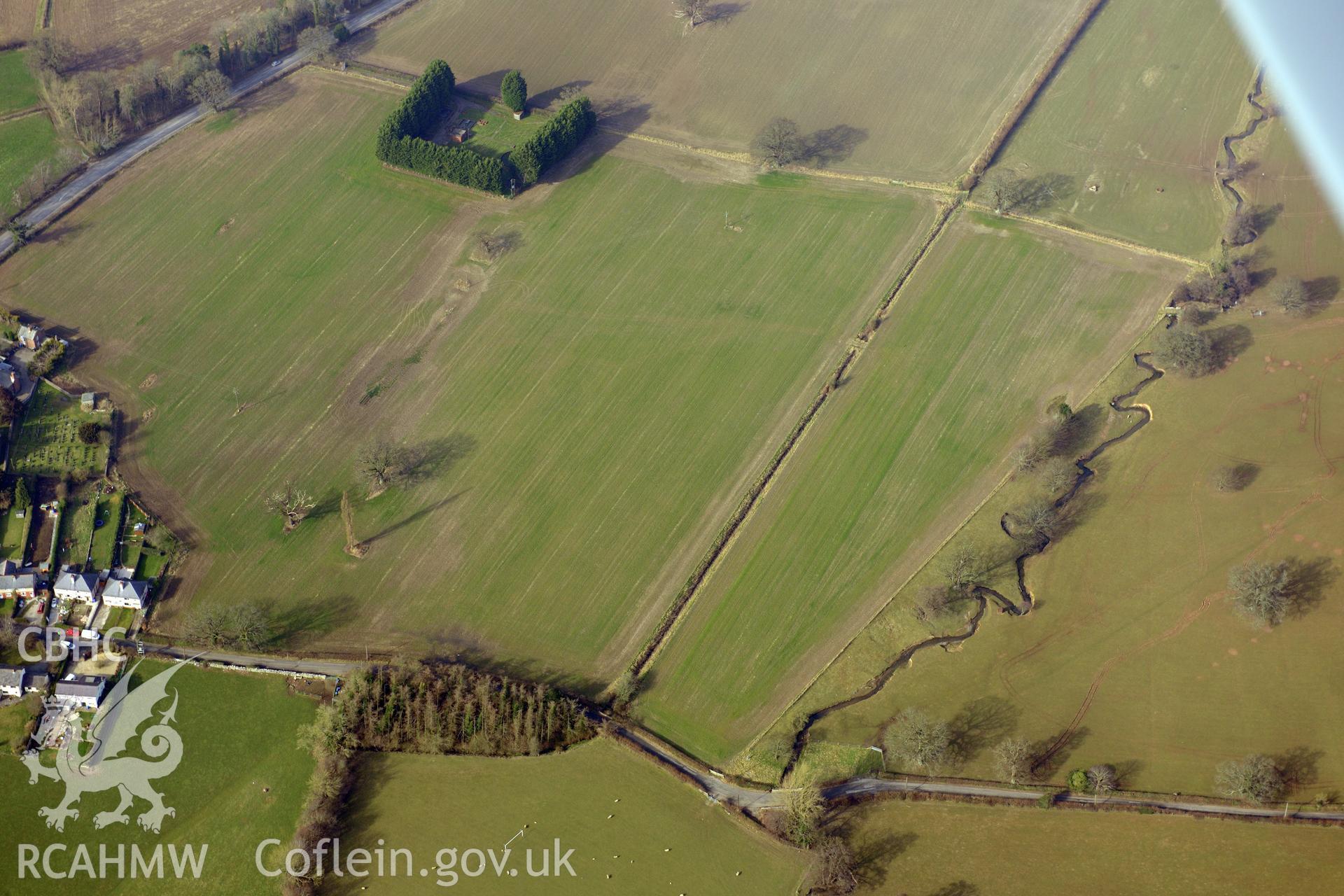Plas Newydd Romano-British temple cropmark, Llanfair Dyffryn Clwyd, south east of Ruthin. Oblique aerial photograph taken during the Royal Commission?s programme of archaeological aerial reconnaissance by Toby Driver on 28th February 2013.