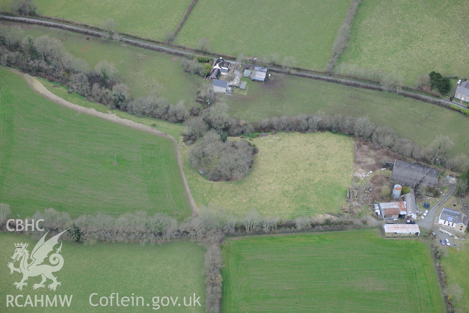 Castell Pistog motte, Llandyfriog, near Llandysul. Oblique aerial photograph taken during the Royal Commission's programme of archaeological aerial reconnaissance by Toby Driver on 13th March 2015.