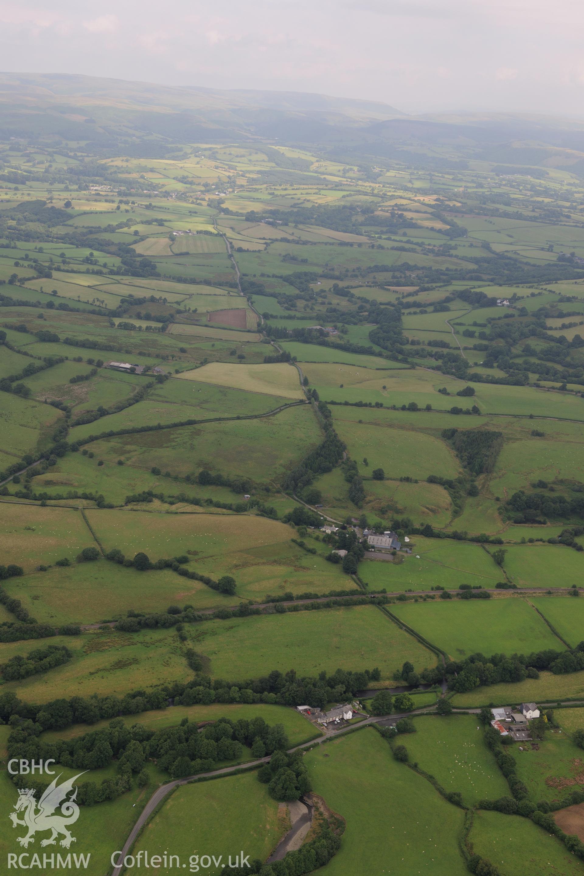 Roman road between Beulah and Llandovery (part of RR623). Grid Reference: SN 920 473. Oblique aerial photograph taken during the Royal Commission?s programme of archaeological aerial reconnaissance by Toby Driver on 1st August 2013.