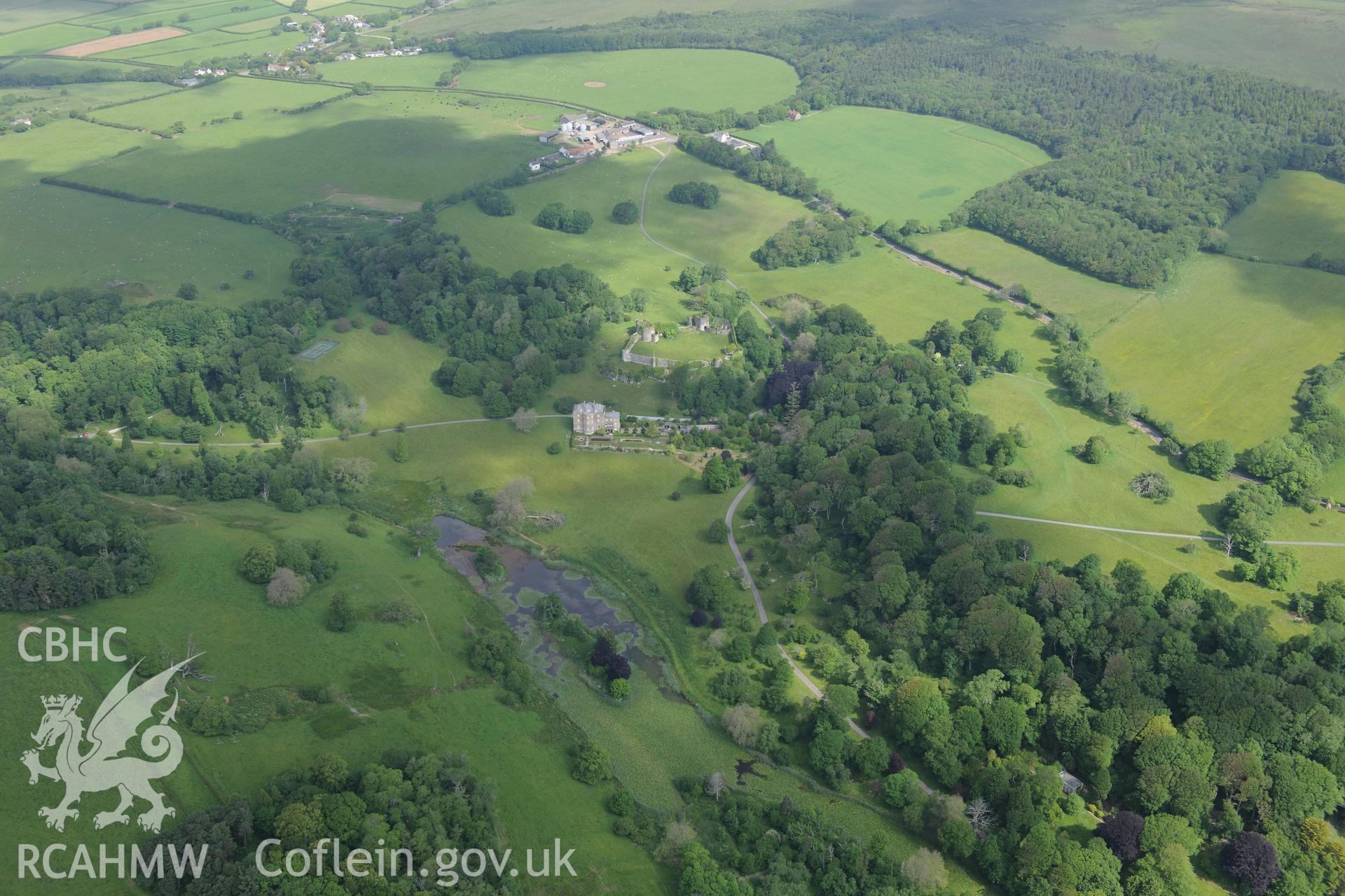 Penrice Castle, Mansion, Garden and Home Farm. Oblique aerial photograph taken during the Royal Commission's programme of archaeological aerial reconnaissance by Toby Driver on 19th June 2015.