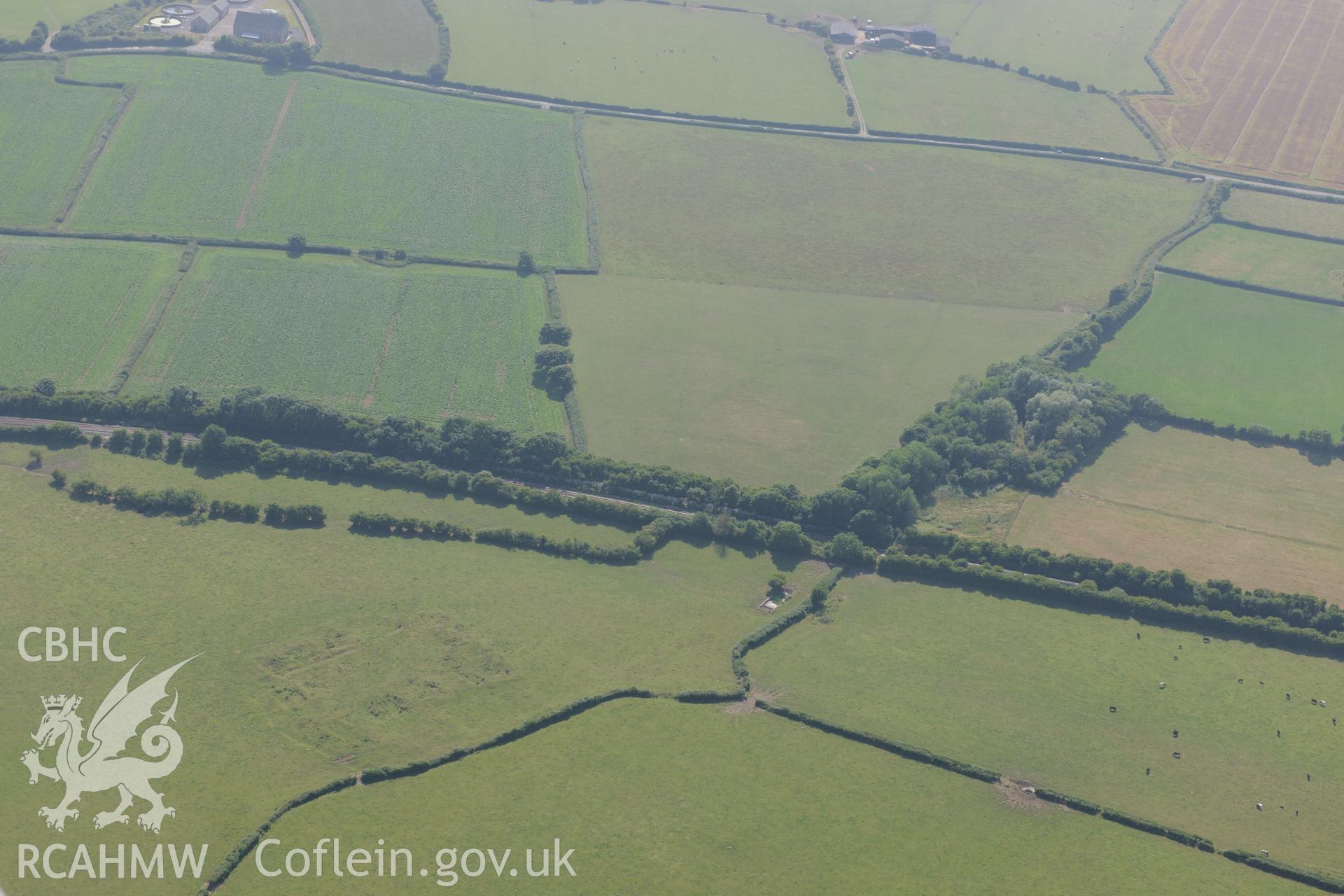 Caermead Roman villa and water lane defended enclosure, north west of Llantwit Major. Oblique aerial photograph taken during the Royal Commission?s programme of archaeological aerial reconnaissance by Toby Driver on 1st August 2013.