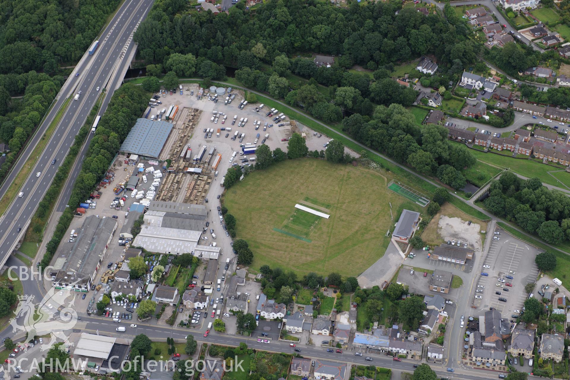 St. Asaph cricket and social club, Plas Elwy and Min-Afon, St. Asaph. Oblique aerial photograph taken during the Royal Commission's programme of archaeological aerial reconnaissance by Toby Driver on 30th July 2015.