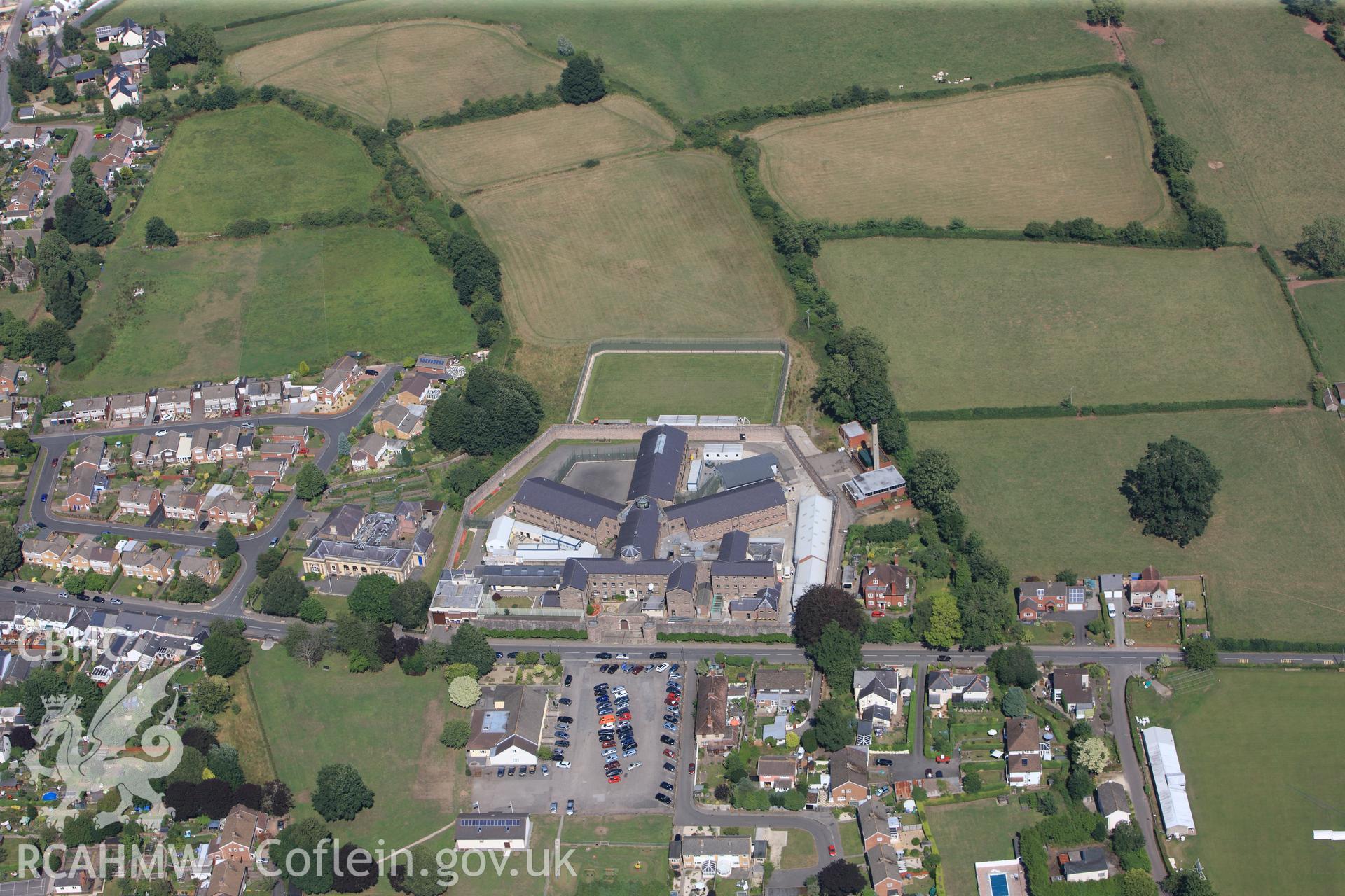 The Session House, H.M. Prison, Usk, and Usk Roman site: 'Burrium.' Oblique aerial photograph taken during the Royal Commission?s programme of archaeological aerial reconnaissance by Toby Driver on 1st August 2013.