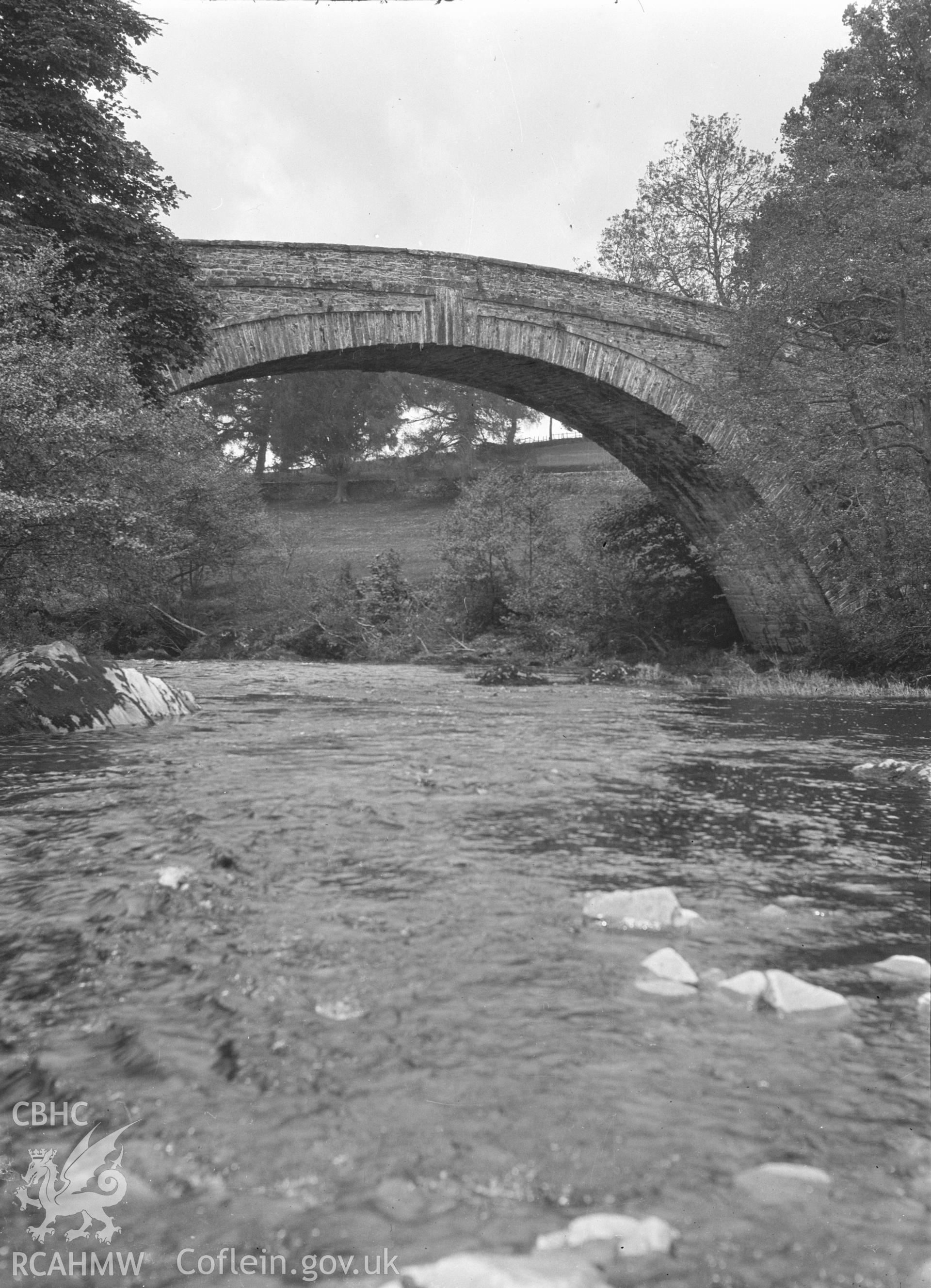 Digital copy of a nitrate negative showing view of Rhyd Llanfair Bridge, Denbighshire, taken by Leonard Monroe.