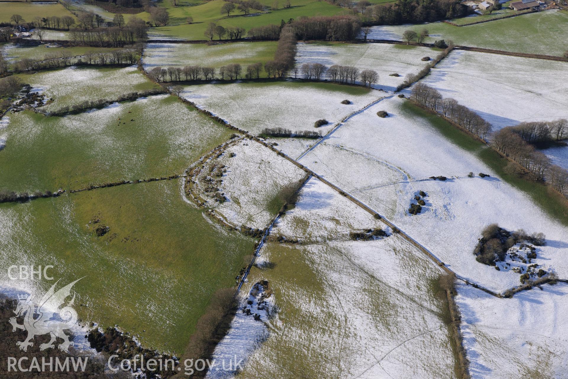 Pencoed y Foel hillfort, north east of Llandysul. Oblique aerial photograph taken during the Royal Commission's programme of archaeological aerial reconnaissance by Toby Driver on 4th February 2015.