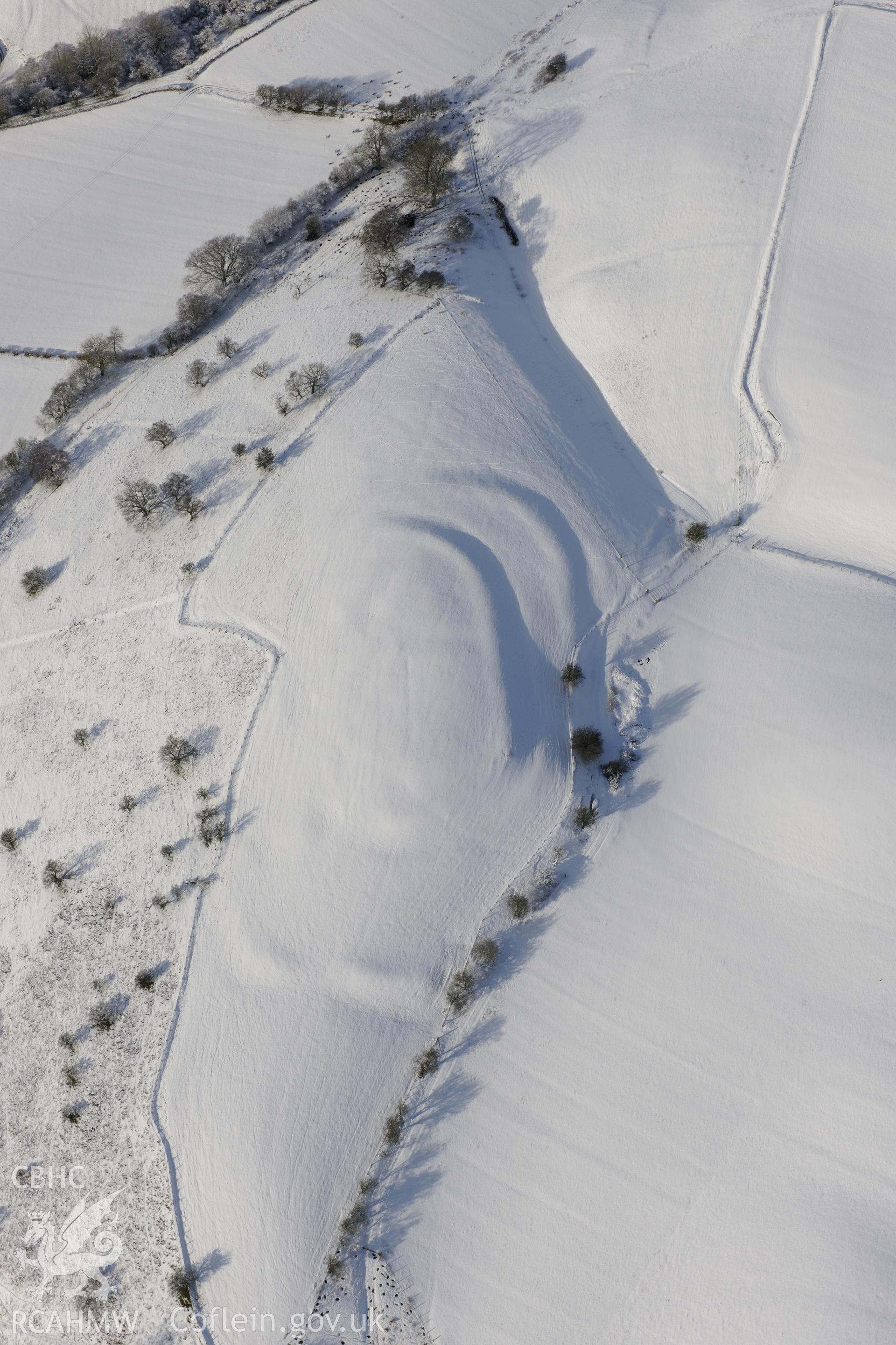 Wern Camp defended enclosure, Glascwm, north east of Builth Wells. Oblique aerial photograph taken during the Royal Commission?s programme of archaeological aerial reconnaissance by Toby Driver on 15th January 2013.