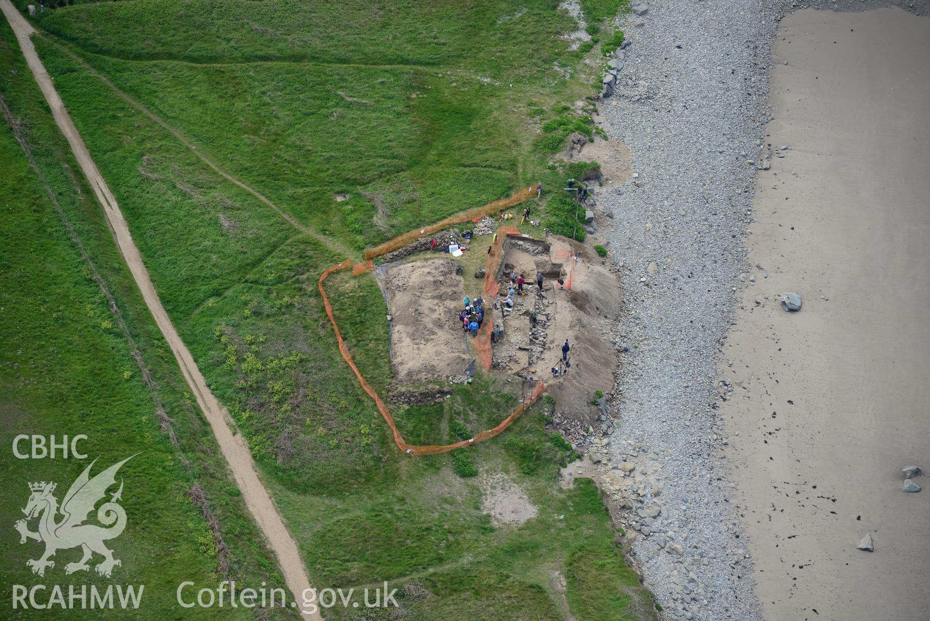 Dyfed Archaeological Trust excavating site of St. Patrick's chapel at Whitesands Bay. Oblique aerial photograph taken during the Royal Commission's programme of archaeological aerial reconnaissance by Toby Driver on 13th May 2015.