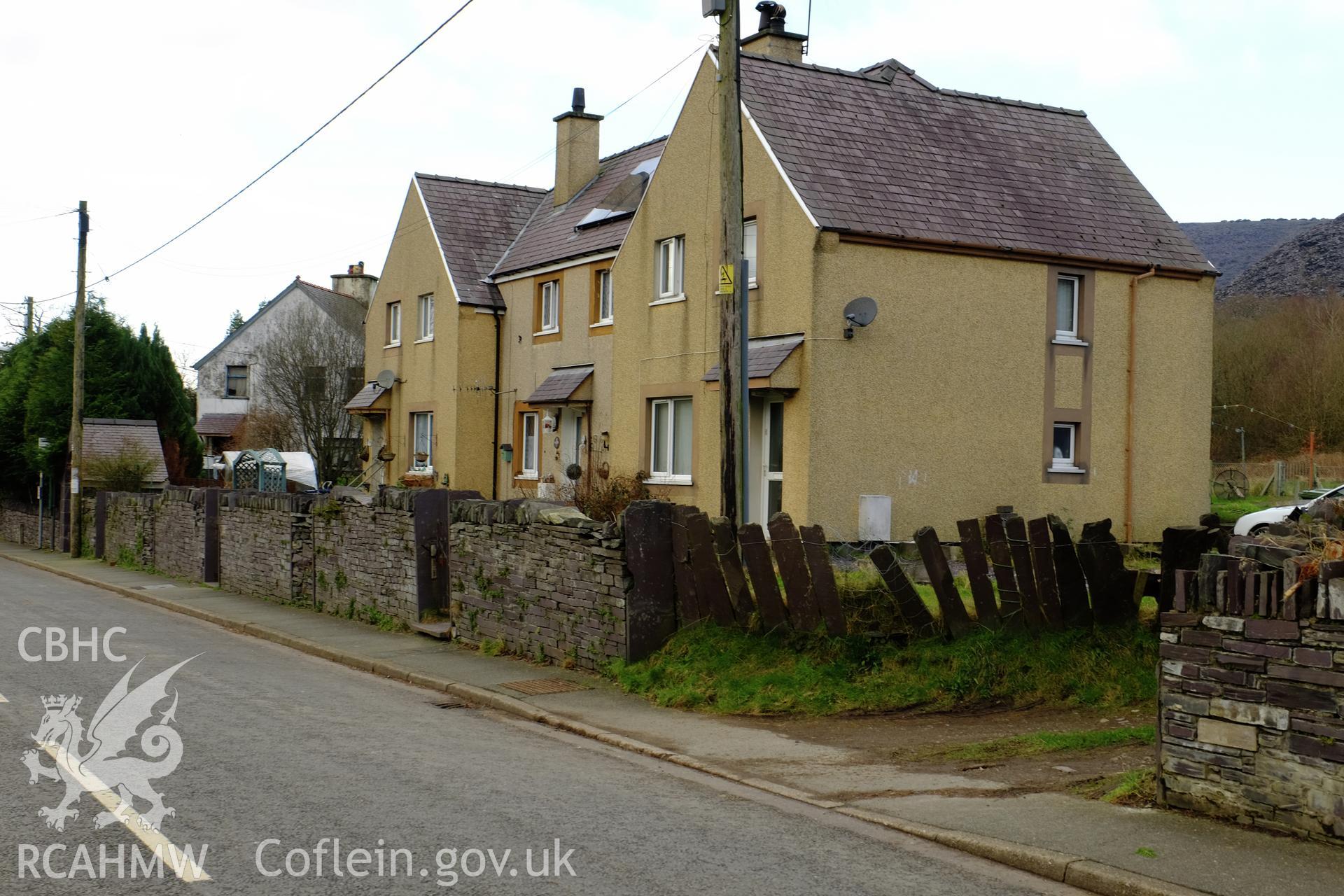 Colour photograph showing traditional slate walls to modern houses on the main street (B4418), Nantlle produced by Richard Hayman 9th February 2017