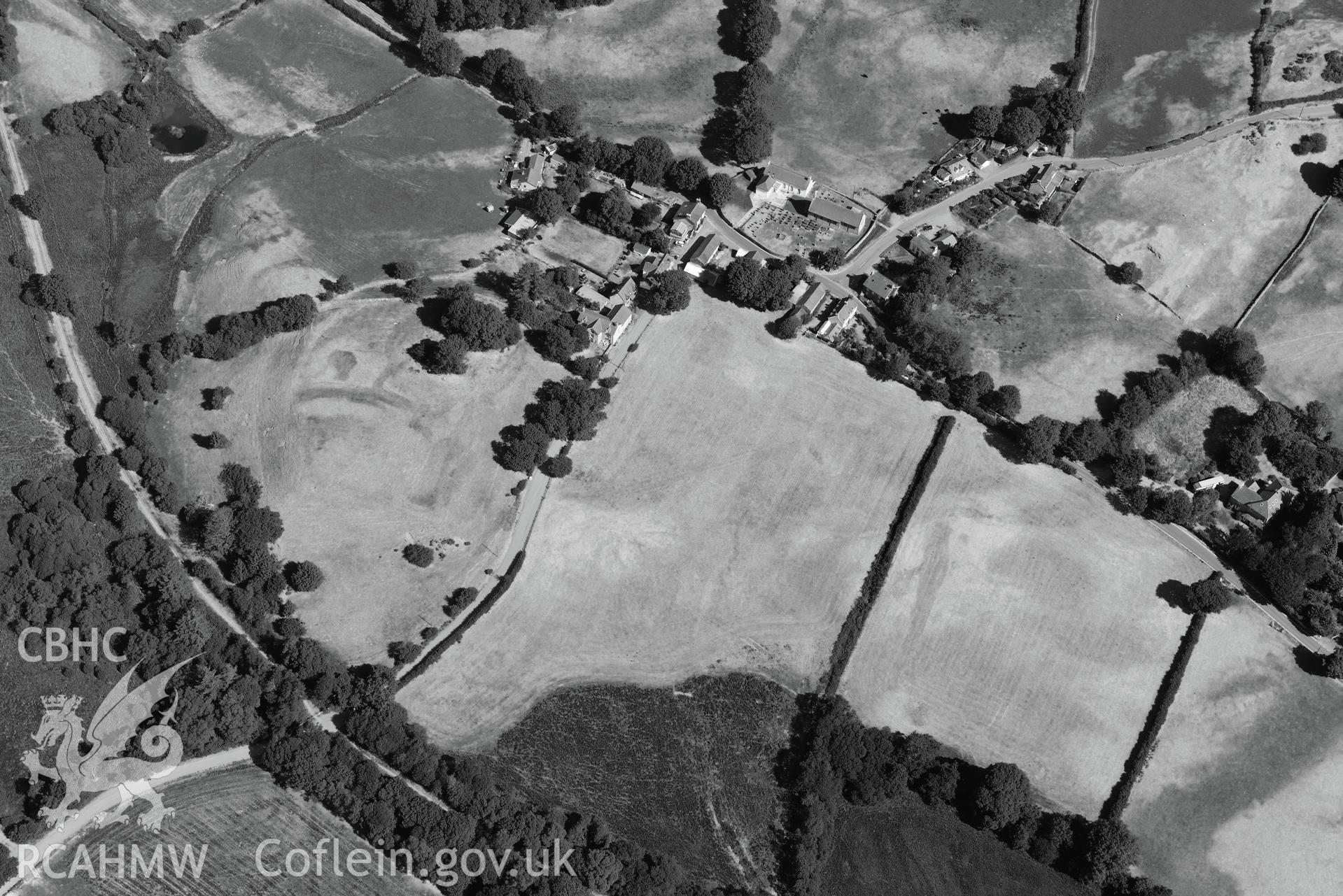 Royal Commission aerial photography of Ystrad Meurig castle and village with extensive parching, taken on 19th July 2018 during the 2018 drought.