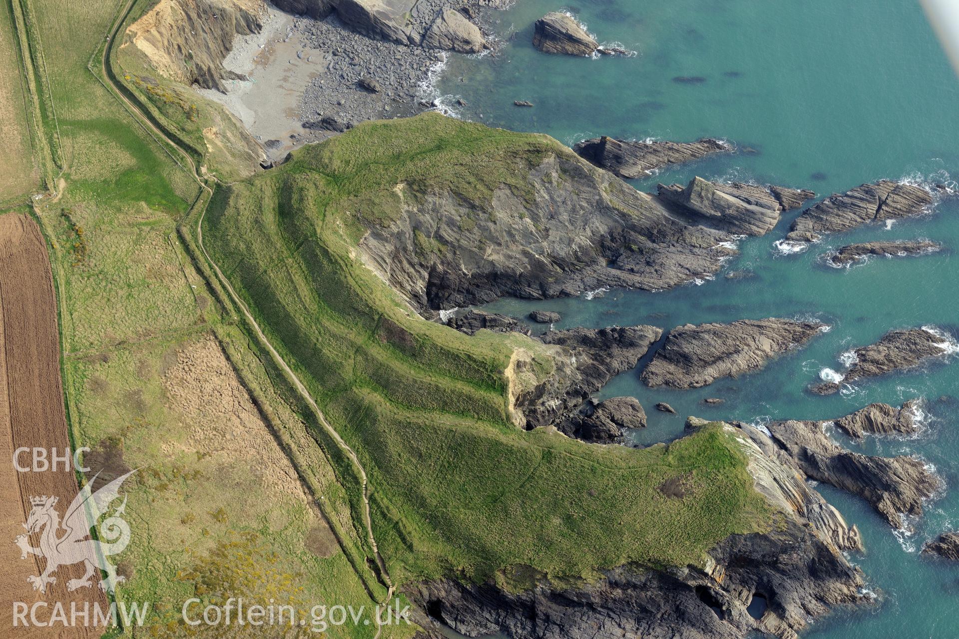 Aerial photography of Porth y Rhaw promontory fort taken on 27th March 2017 for structure from motion recording. Baseline aerial reconnaissance survey for the CHERISH Project. ? Crown: CHERISH PROJECT 2019. Produced with EU funds through the Ireland Wales Co-operation Programme 2014-2020. All material made freely available through the Open Government Licence.