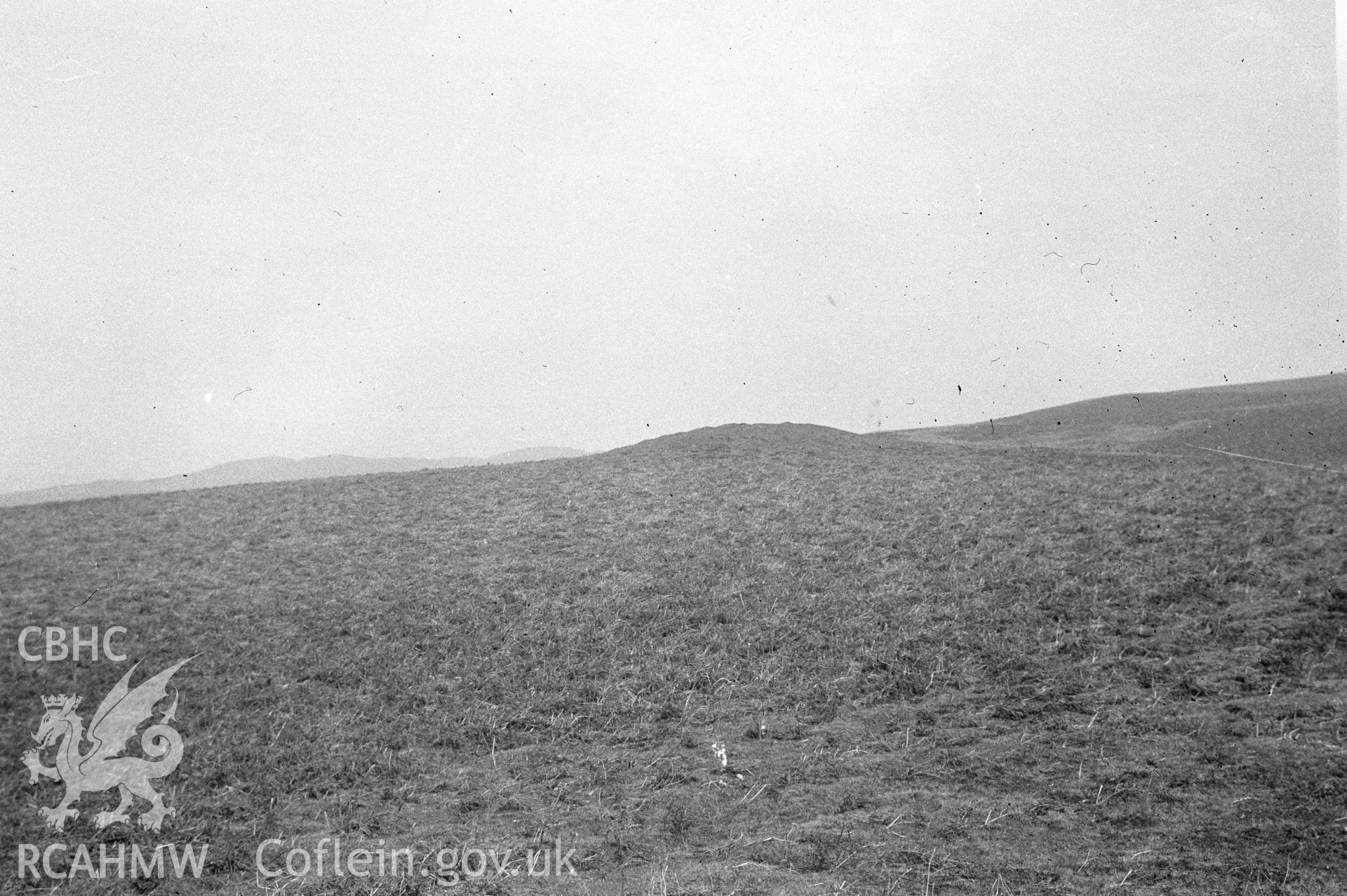 Digital copy of a nitrate negative showing Aberedw Hill Tumuli. From Cadw Monuments in Care Collection.