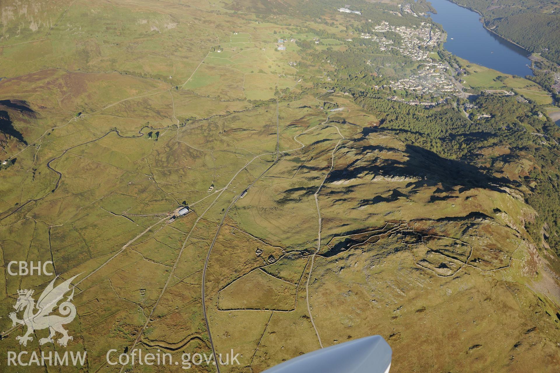 Derlwyn sheep fold and Bryn Coch sheep fold, above the town of Llanberis, on the shore of Llyn Padarn. Oblique aerial photograph taken during the Royal Commission's programme of archaeological aerial reconnaissance by Toby Driver on 2nd October 2015.