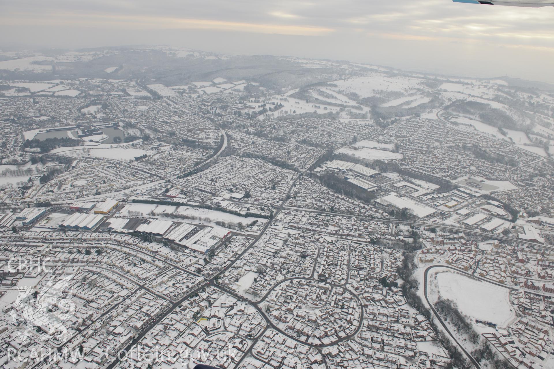 Trecenydd, part of Caerphilly, viewed from the north west. Oblique aerial photograph taken during the Royal Commission?s programme of archaeological aerial reconnaissance by Toby Driver on 24th January 2013.