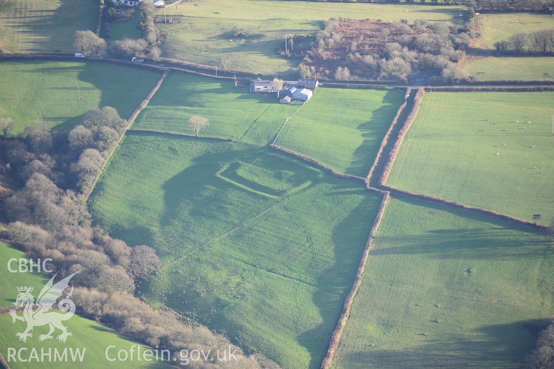 Bryn Cywyn Llangynog II, earthwork enclosure. Oblique aerial photograph taken during the Royal Commission's programme of archaeological aerial reconnaissance by Toby Driver on 6th January 2015.