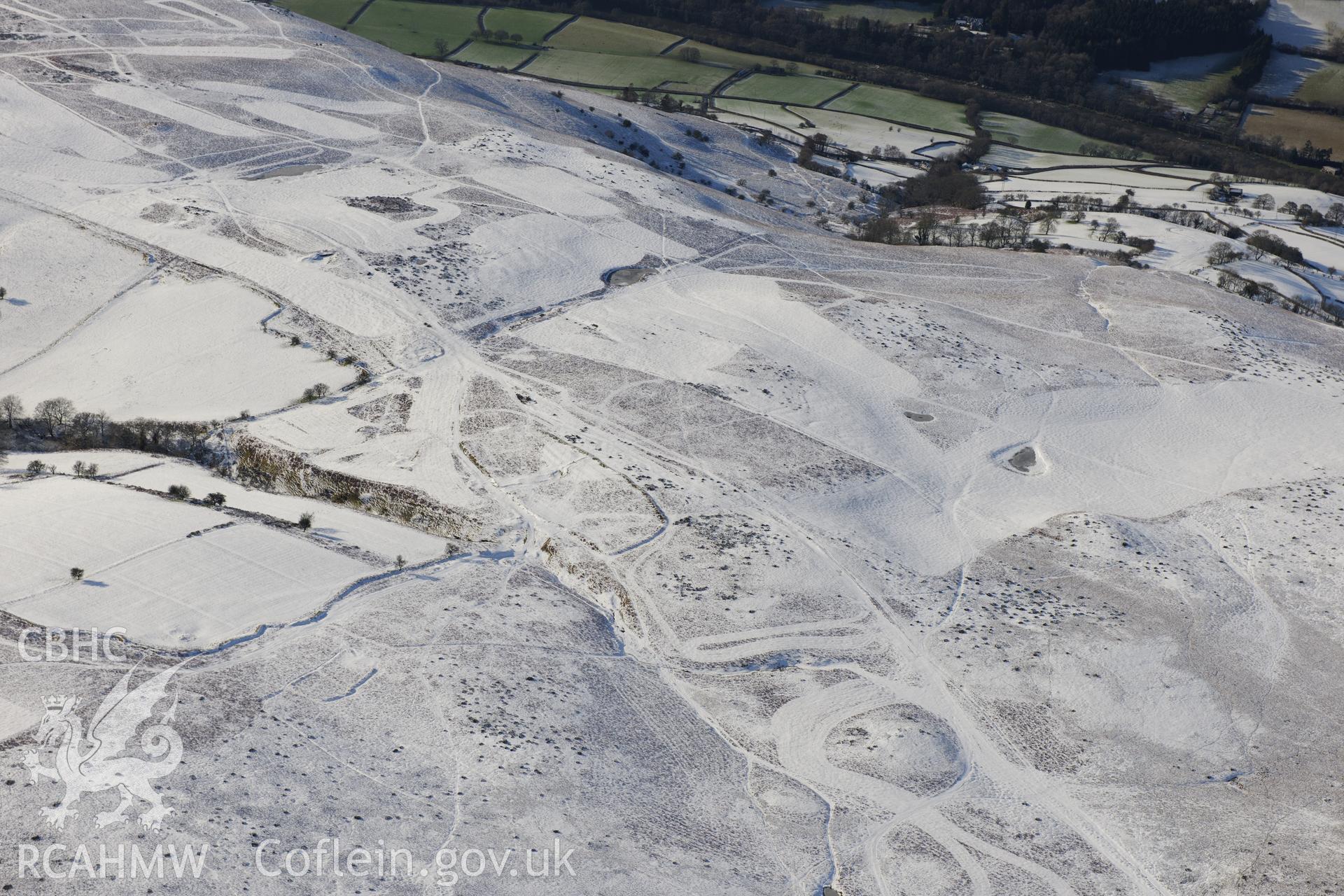 Deserted rural settlement on Aberedw Hill, east of Builth Wells. Oblique aerial photograph taken during the Royal Commission?s programme of archaeological aerial reconnaissance by Toby Driver on 15th January 2013.