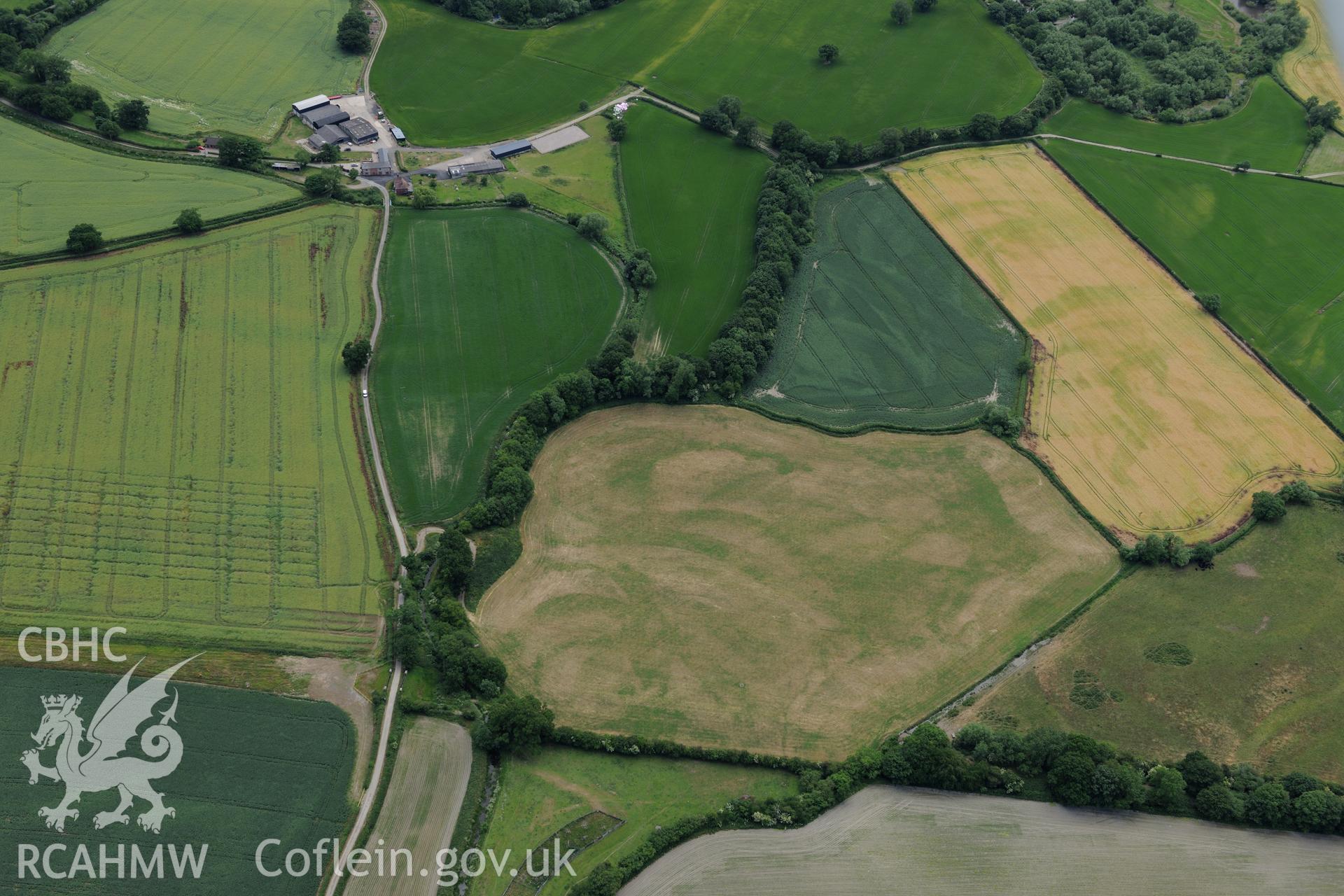 Clawdd Coch Roman site, north east of Welshpool. Oblique aerial photograph taken during the Royal Commission's programme of archaeological aerial reconnaissance by Toby Driver on 30th June 2015.