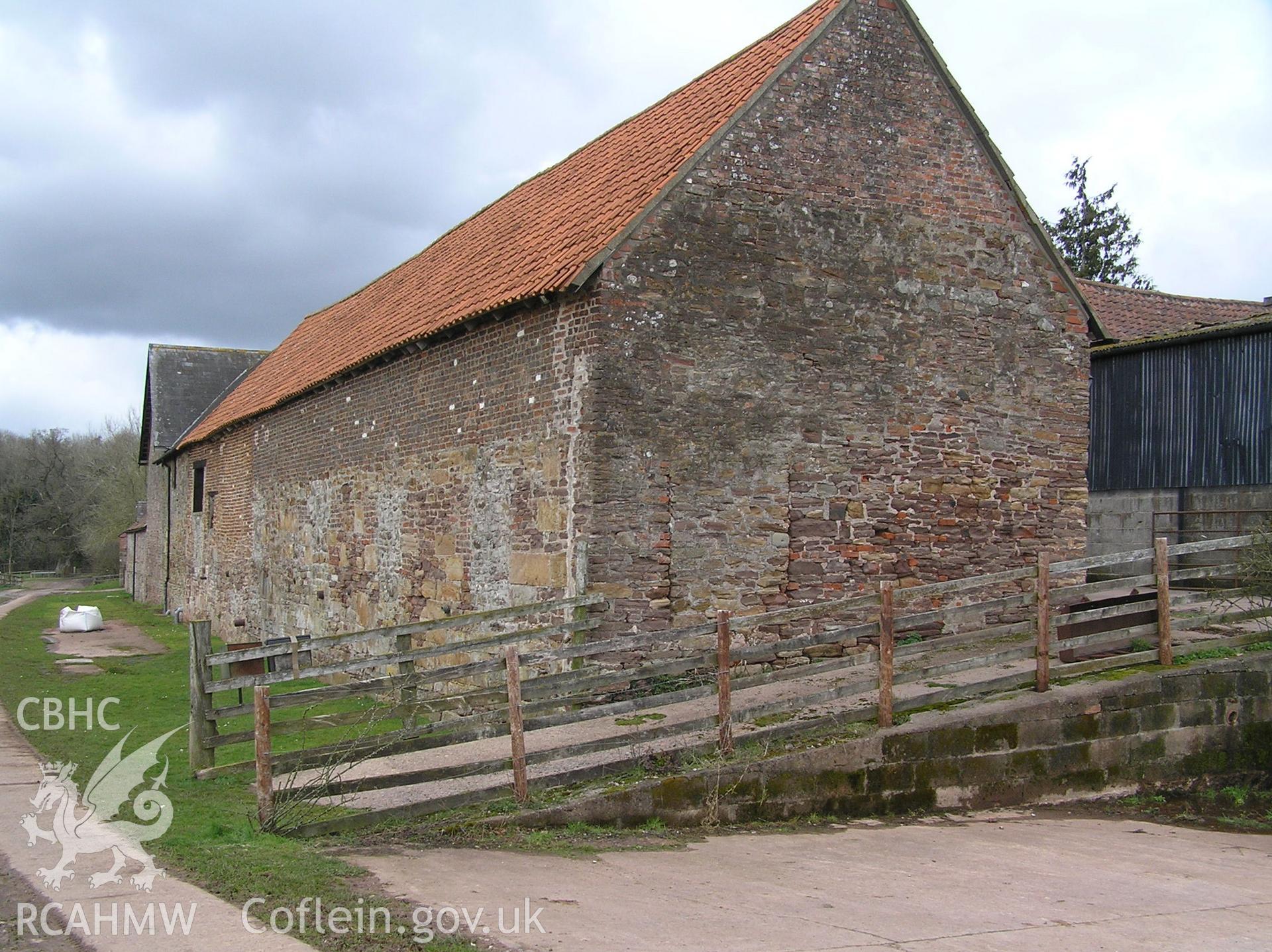 Colour photo showing the south and west elevation of the cowhouse, taken by John Wheelock and donated as a condition of planning consent.