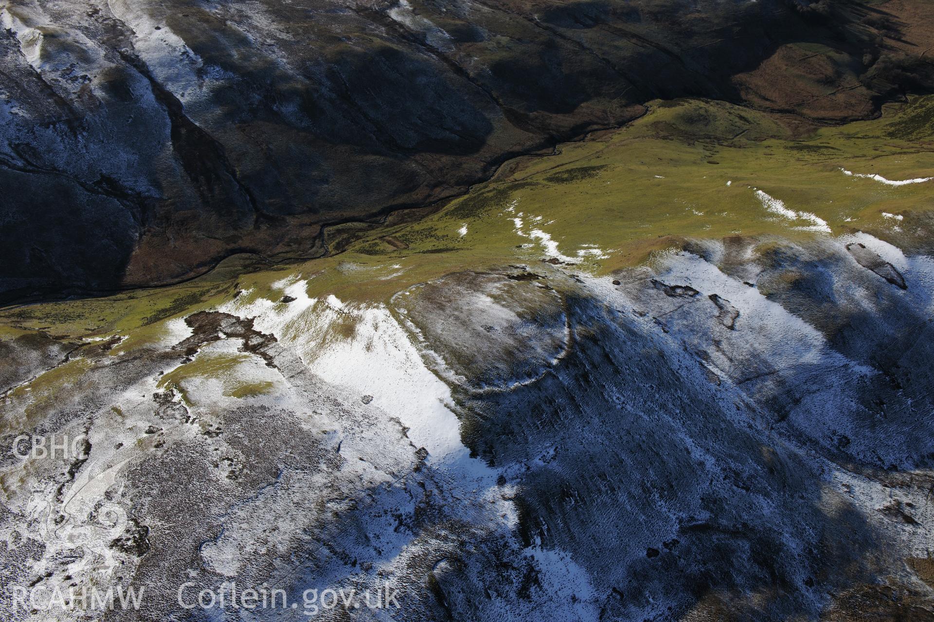 Castell Rhyfel hillfort, east of Tregaron. Oblique aerial photograph taken during the Royal Commission's programme of archaeological aerial reconnaissance by Toby Driver on 4th February 2015.