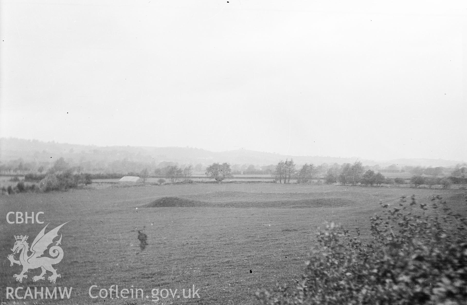 Digital copy of a black and white negative relating to Camp, north-west of Bertholey House. From the Cadw Monuments in Care Collection.