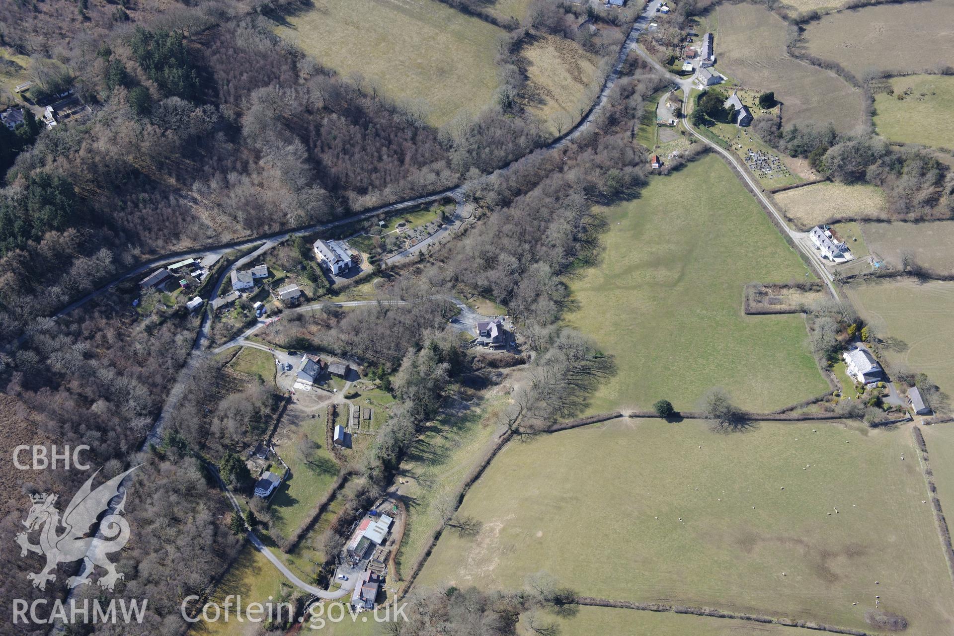 The village of Silian, north of Lampeter. Oblique aerial photograph taken during the Royal Commission?s programme of archaeological aerial reconnaissance by Toby Driver on 2nd April 2015.