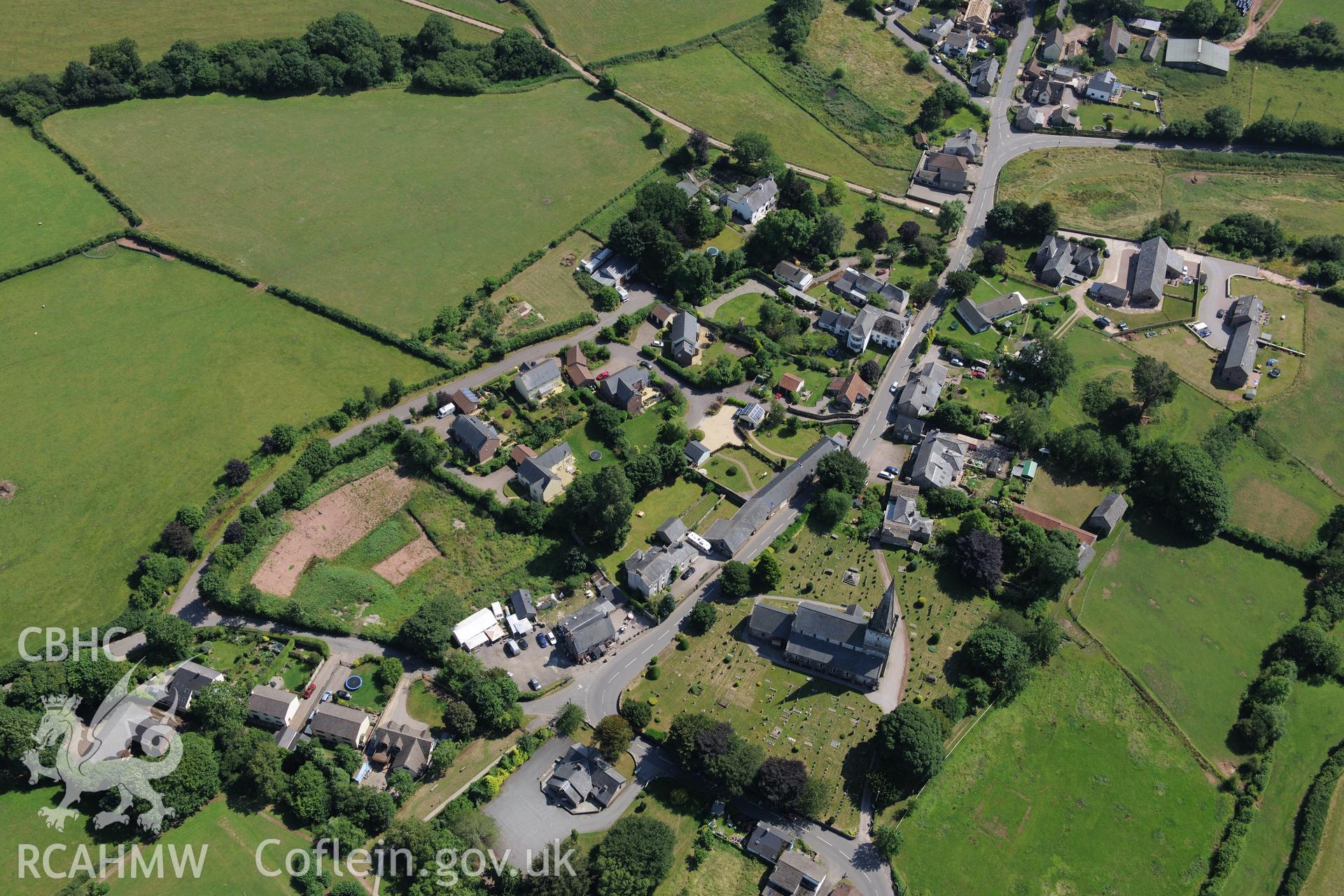 St Nicholas' Church in the village of Trellech, south of Monmouth. Oblique aerial photograph taken during the Royal Commission?s programme of archaeological aerial reconnaissance by Toby Driver on 1st August 2013.