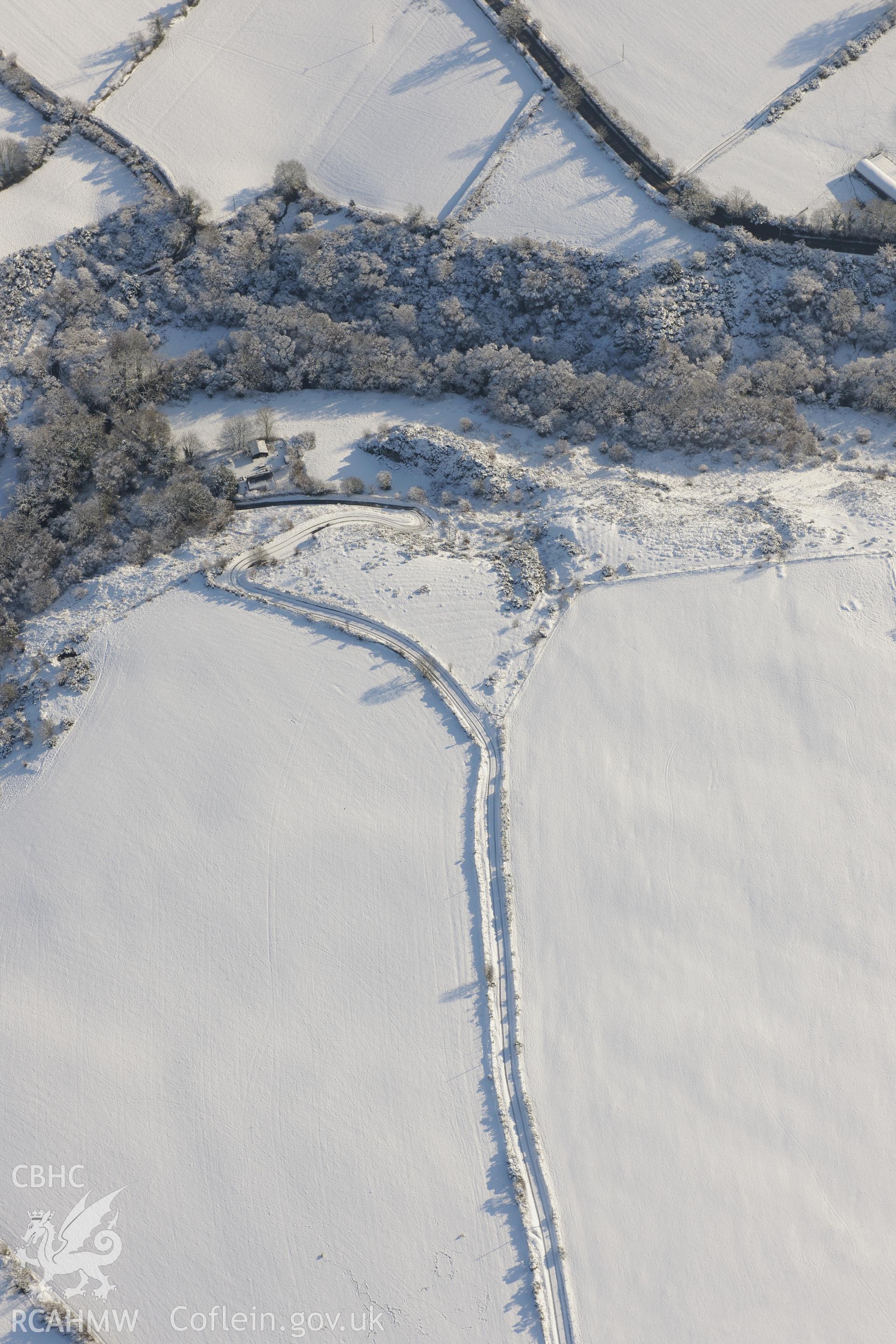 Craig Rhosyfelin bluestone outcrop, south west of Cardigan. Oblique aerial photograph taken during the Royal Commission?s programme of archaeological aerial reconnaissance by Toby Driver on 24th January 2013.