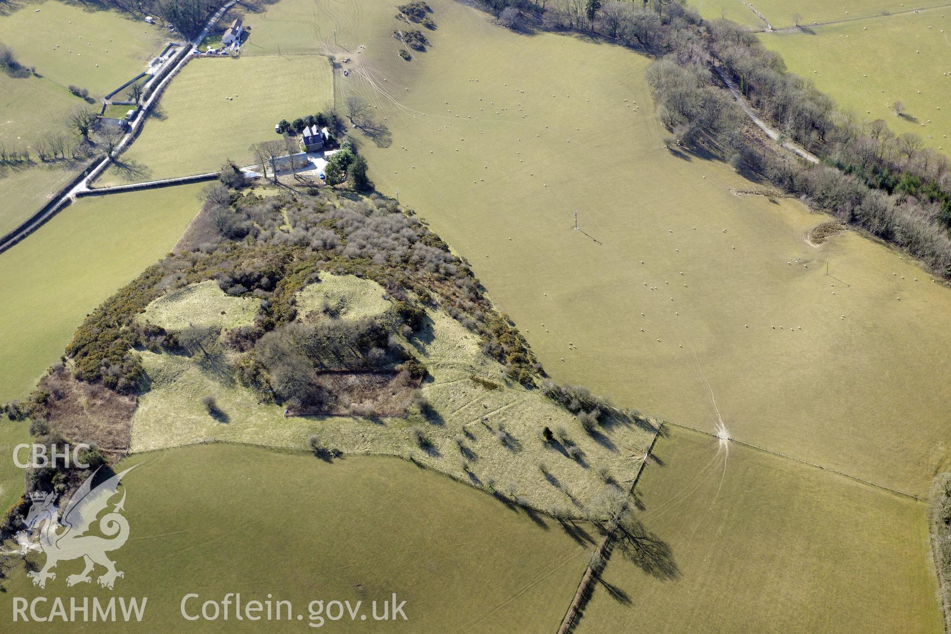 Pen-y-Castell hillfort and a defended enclosure to its north, Llanilar, south east of Aberystwyth. Oblique aerial photograph taken during the Royal Commission's programme of archaeological aerial reconnaissance by Toby Driver on 2nd April 2013.