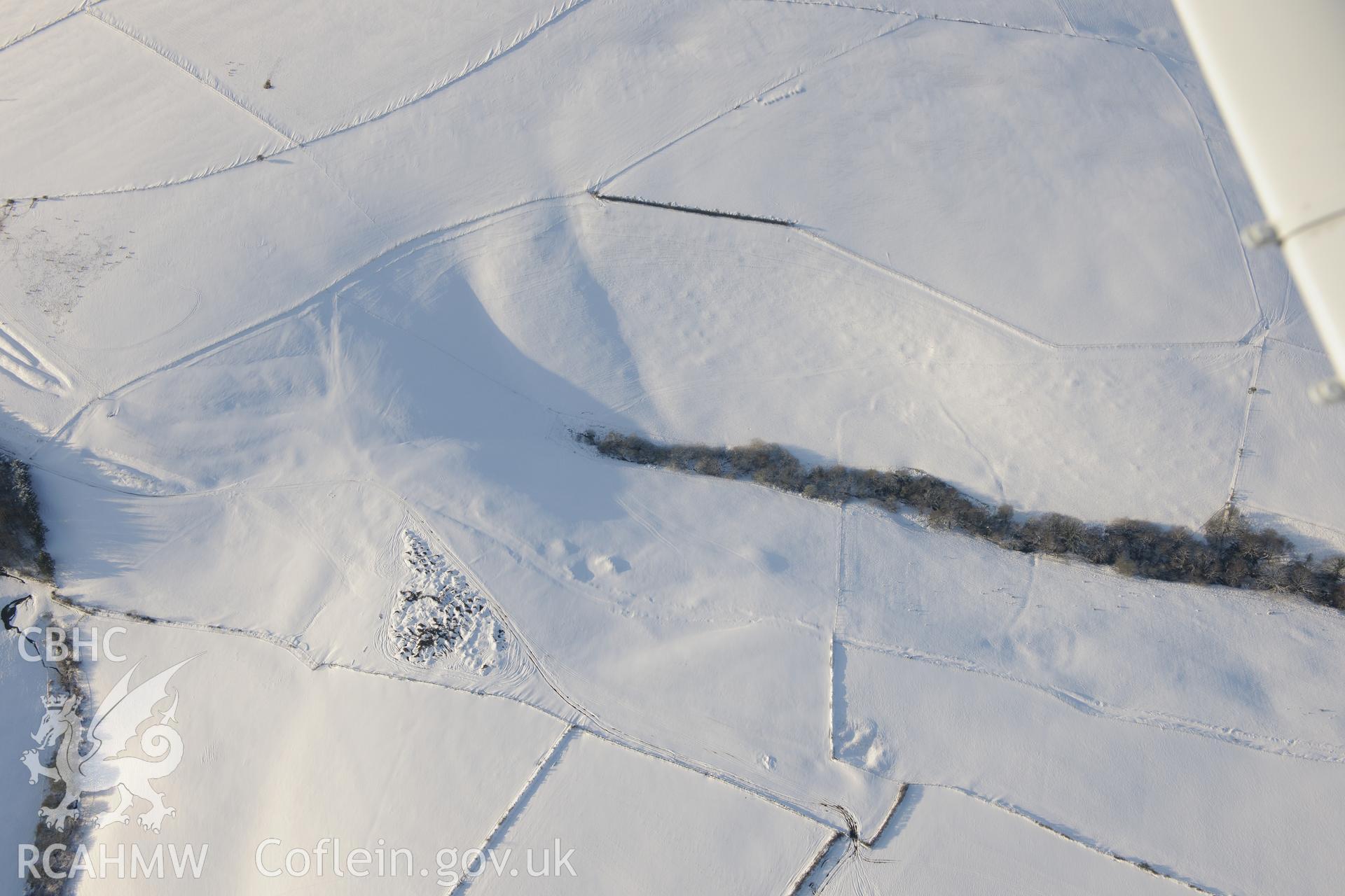 Mynydd Baedan platform, north west of Bridgend. Oblique aerial photograph taken during the Royal Commission?s programme of archaeological aerial reconnaissance by Toby Driver on 24th January 2013.